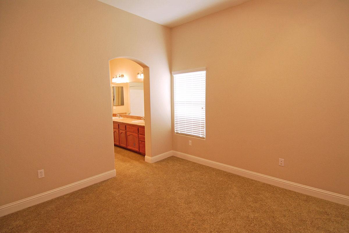 Master bedroom with carpet