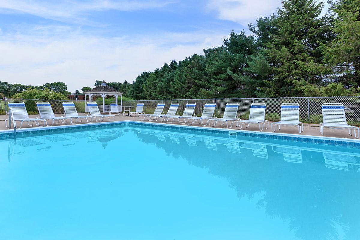 a pool next to a body of water