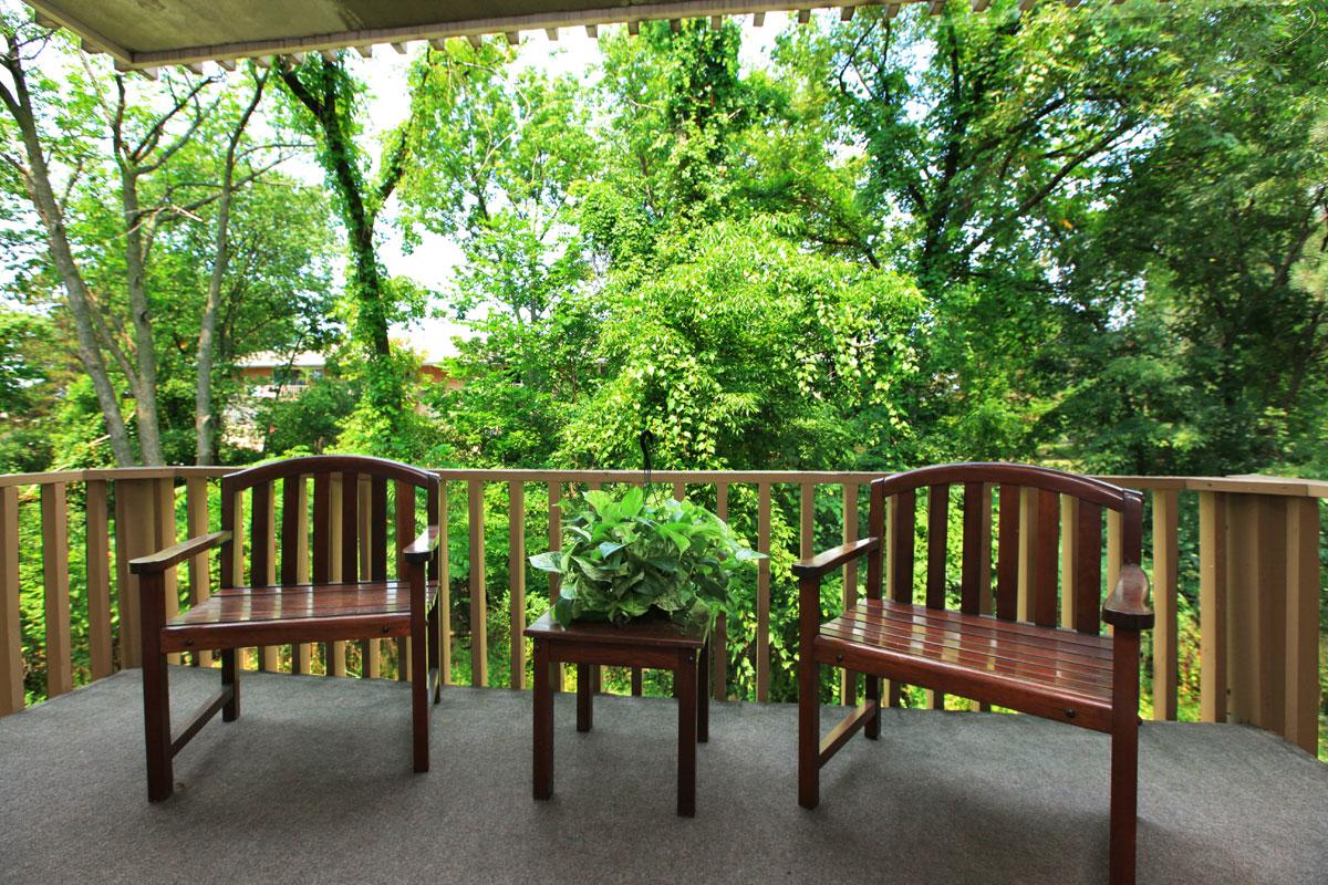 a wooden bench in a park