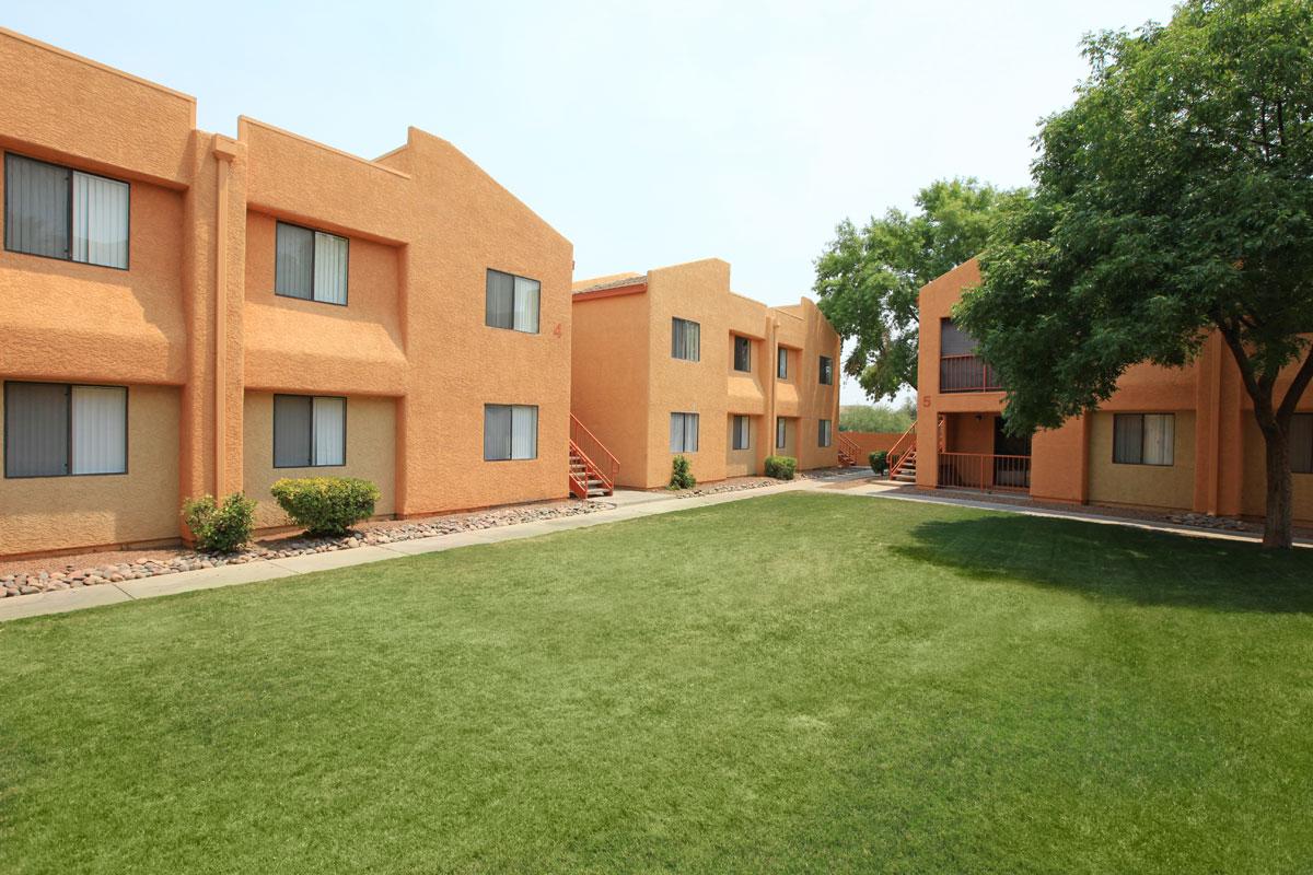 a large lawn in front of a building
