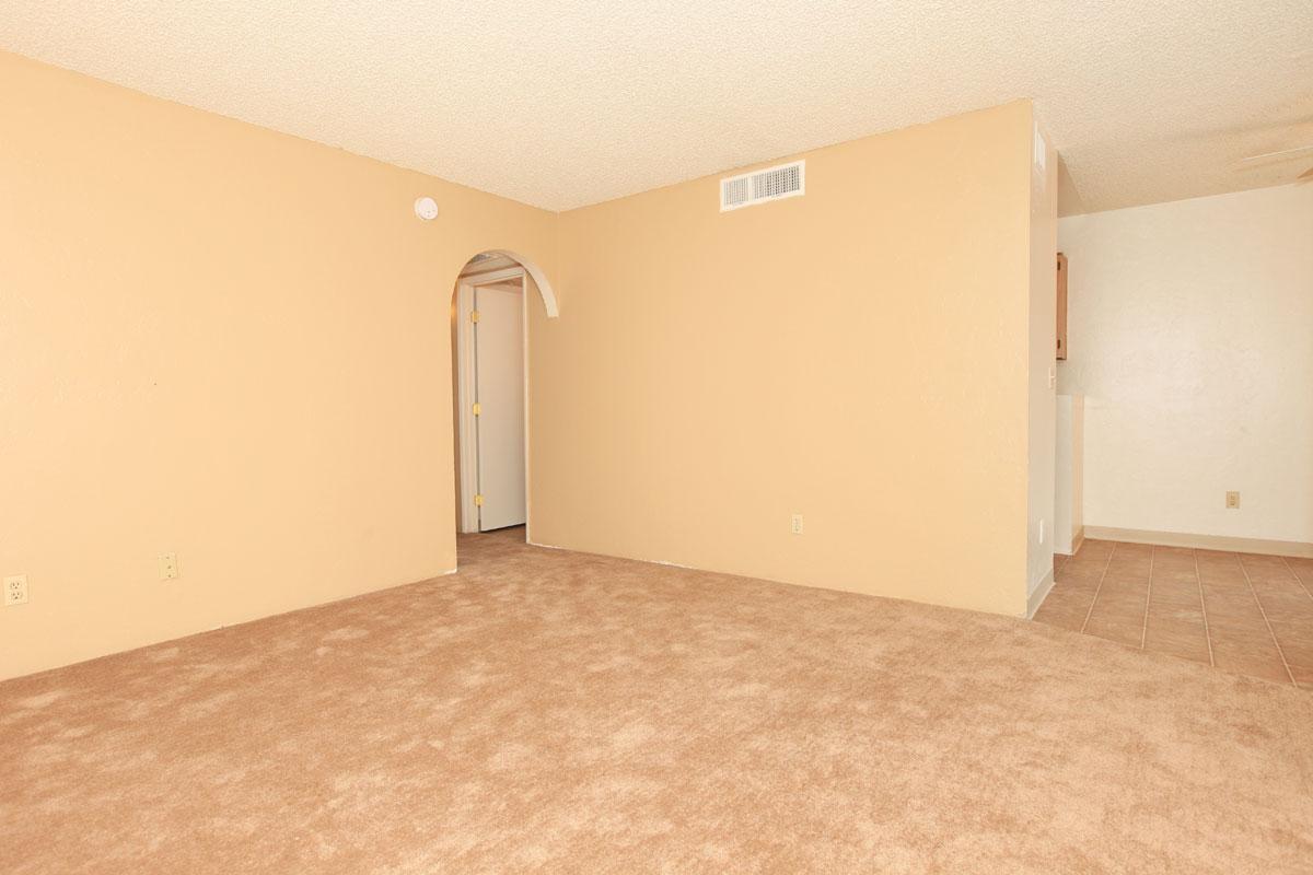 a bedroom with a bed in a room