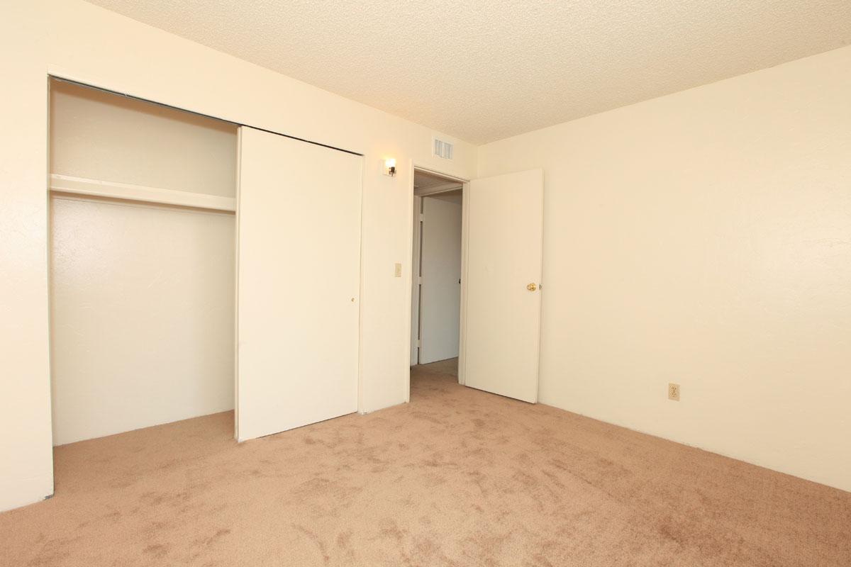 a large white refrigerator in a kitchen