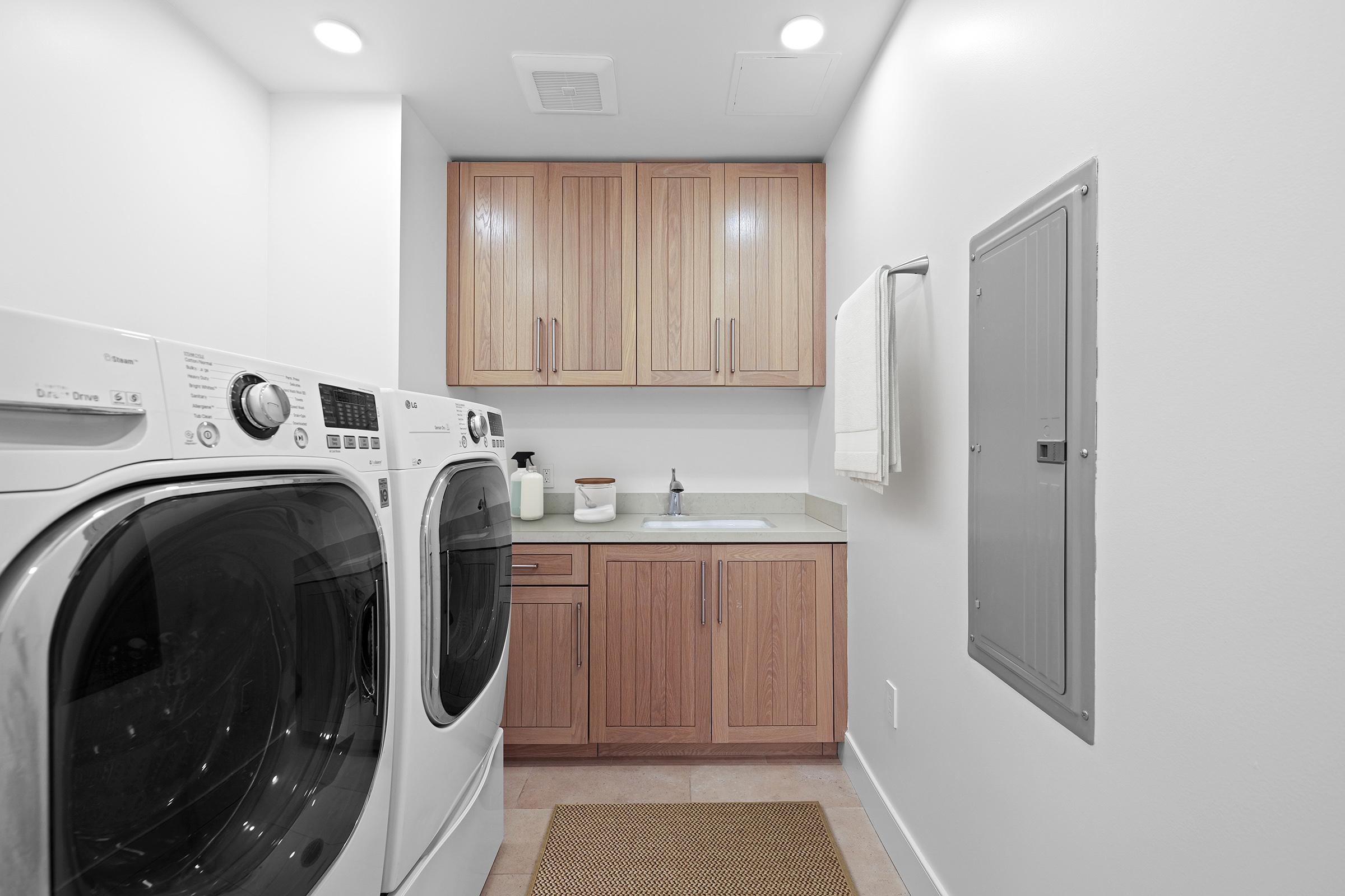 a kitchen with a sink and a microwave