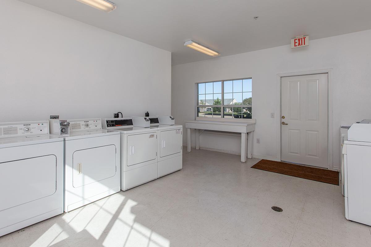 a kitchen with a tile floor