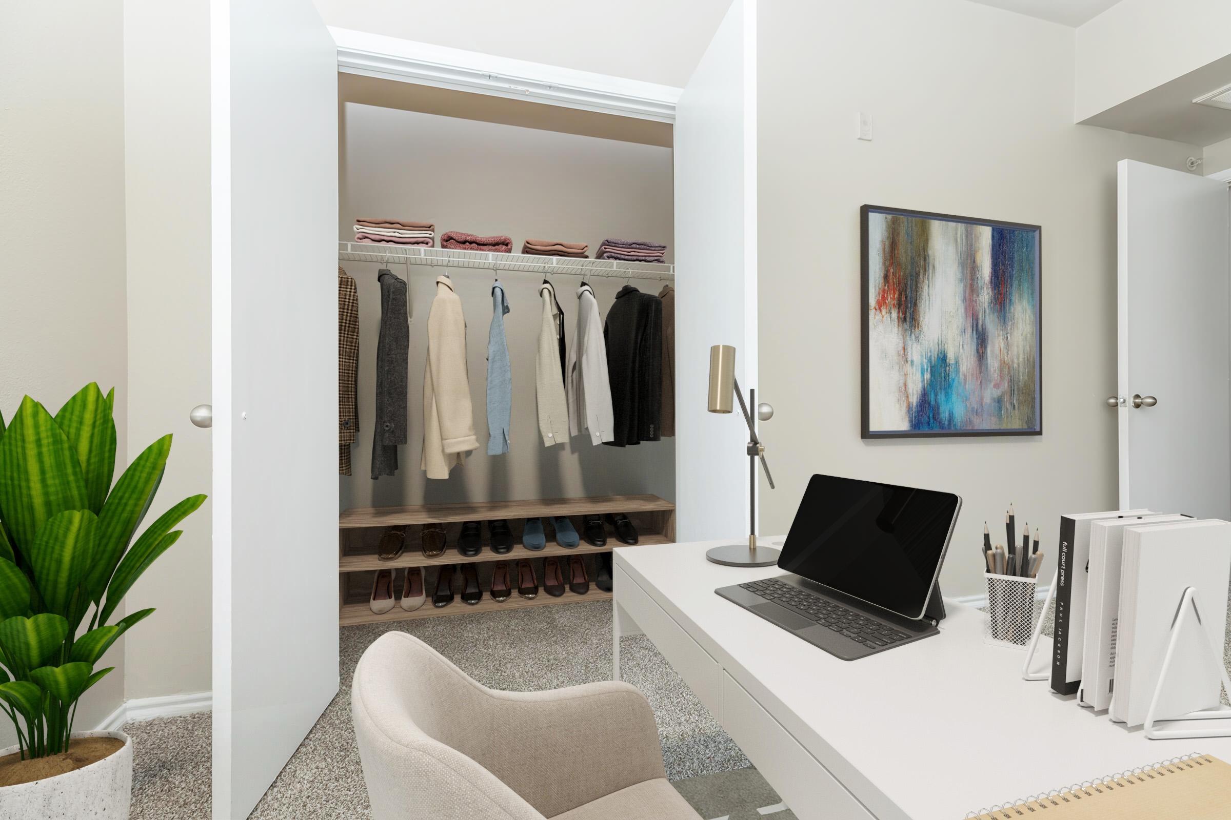 A stylish home office featuring a desk with a tablet, a chair, and organized stationery. In the background, a well-organized closet displays neatly hung clothing and shelves with shoes. A decorative plant adds a touch of greenery, while a colorful abstract painting brightens the wall. The overall ambiance is modern and inviting.