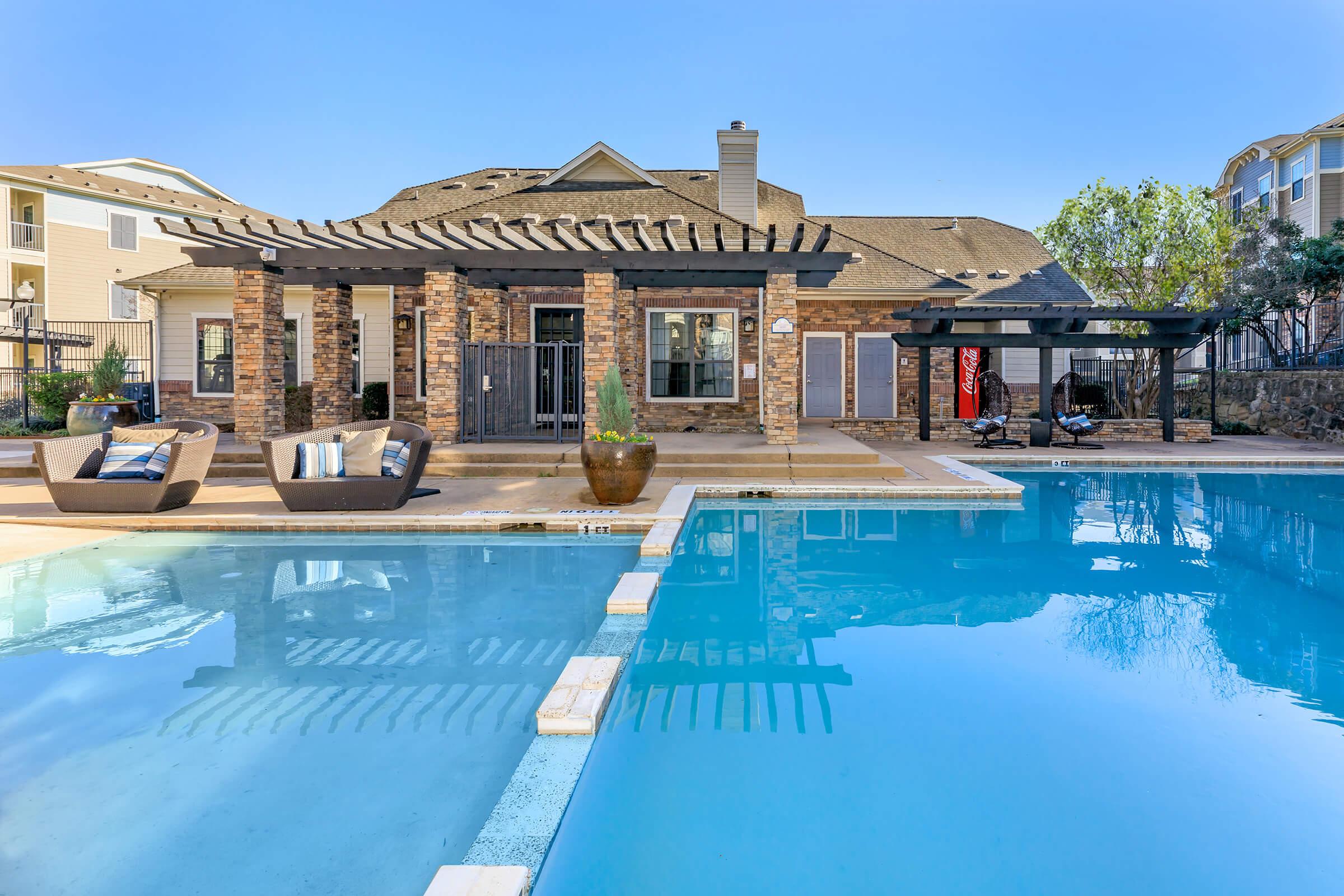 a large pool of water in front of a building