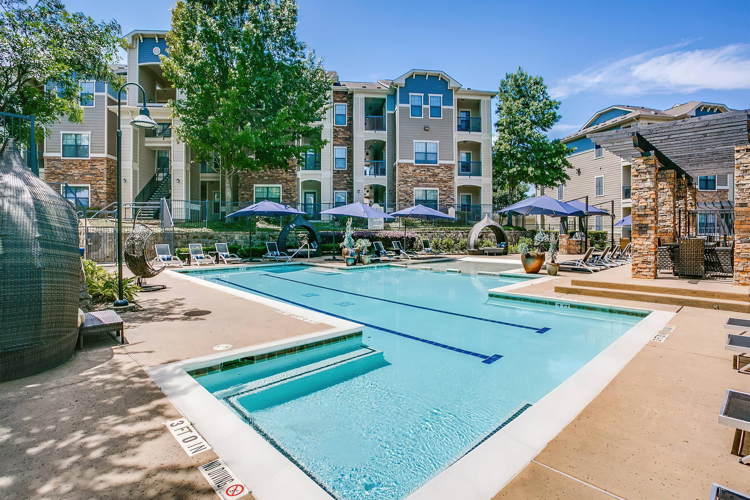 a pool next to a building
