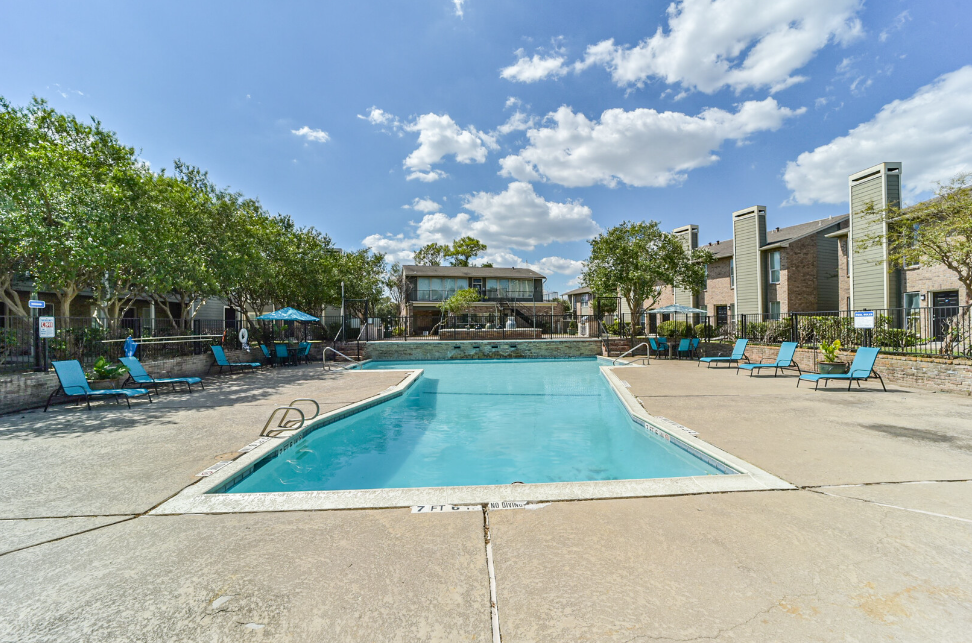 a pool next to a beach