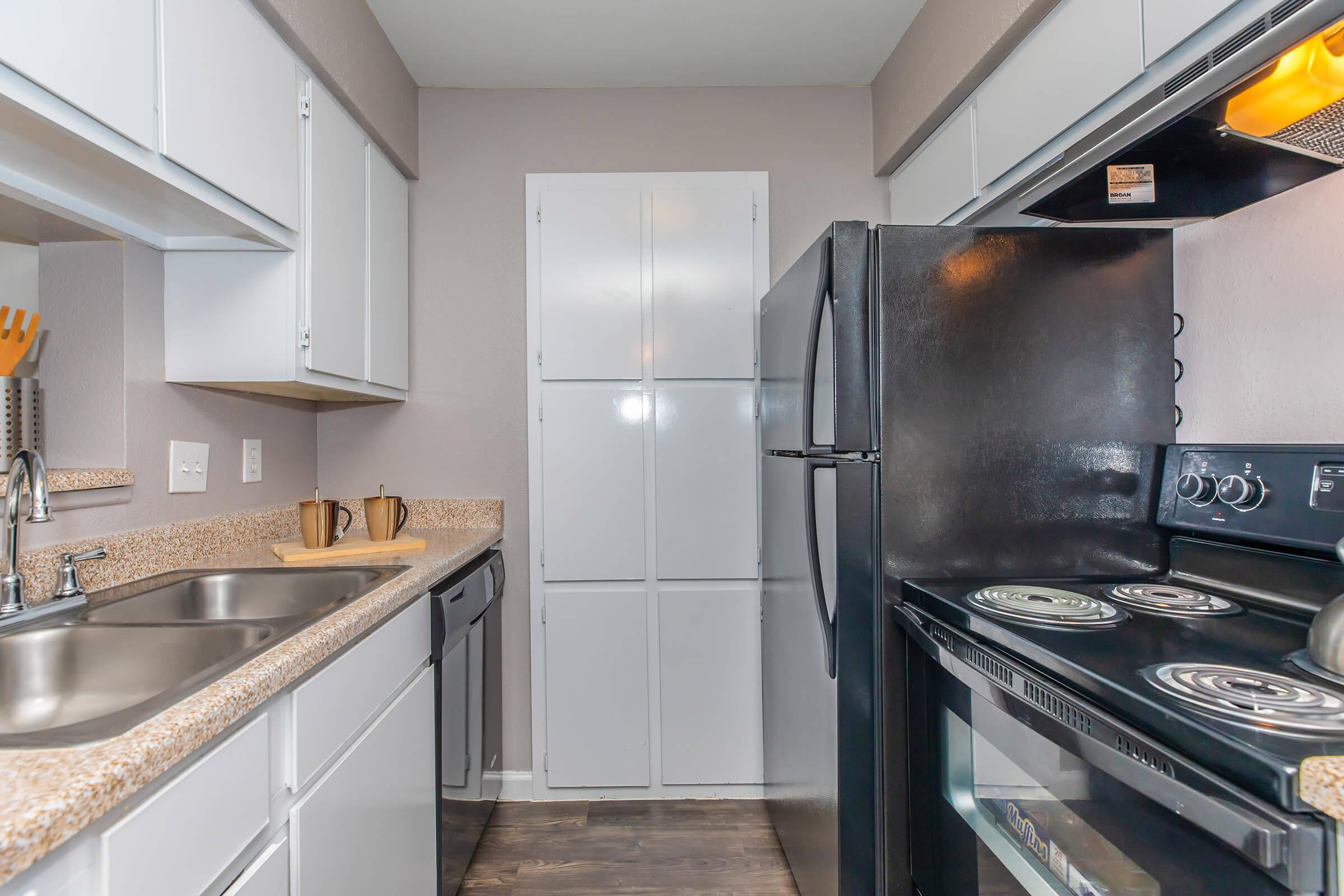 a kitchen with stainless steel appliances