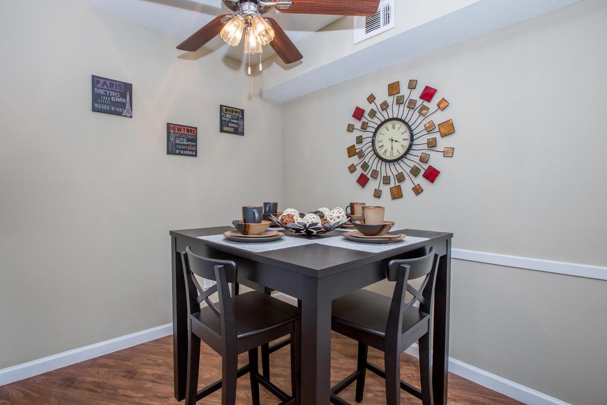 a kitchen with a table in a room