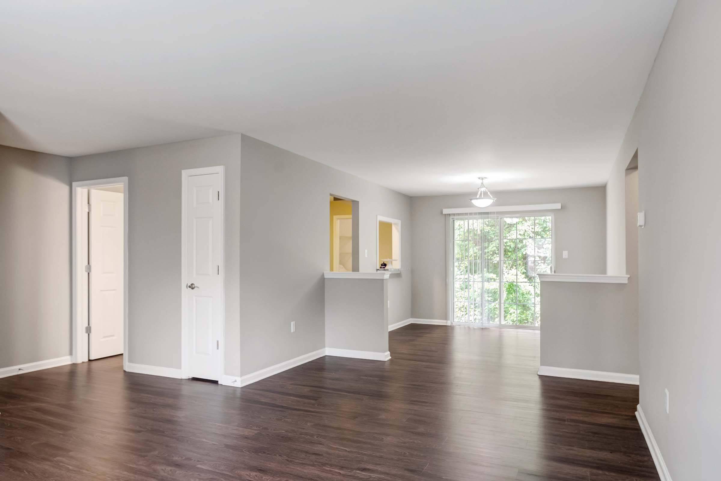 a living room with a wood floor