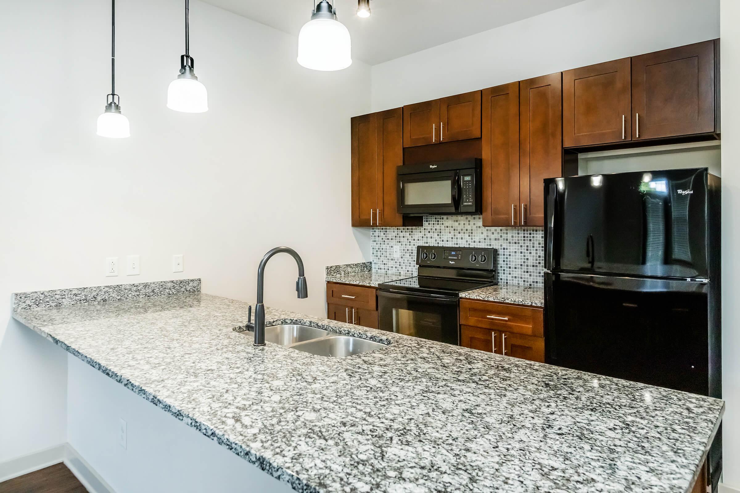 a modern kitchen with stainless steel appliances