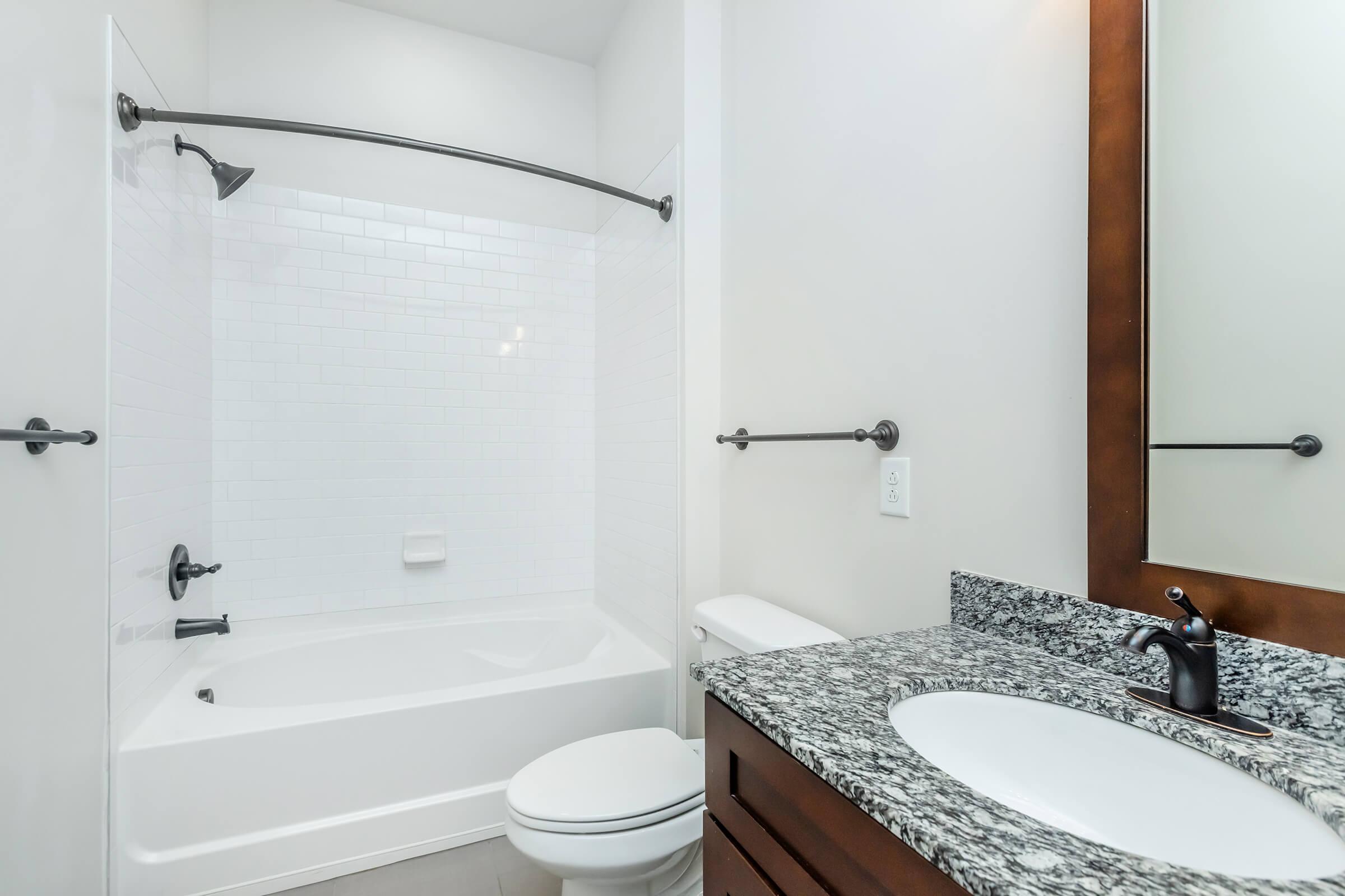 Garden tub and shower with interior view of bathroom 1