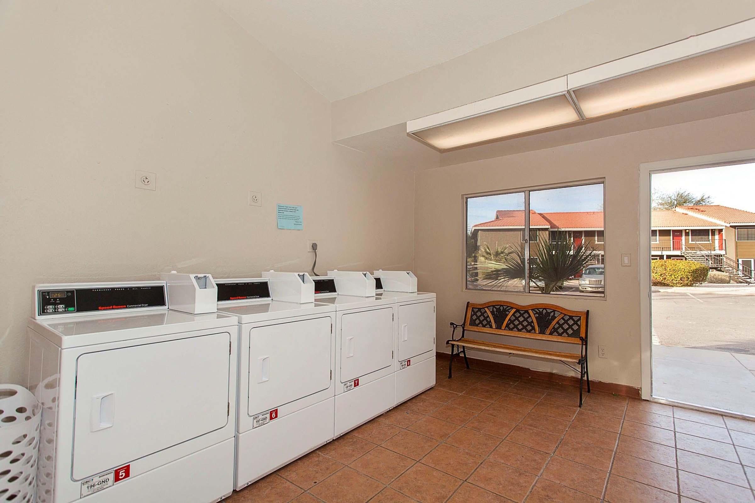 a kitchen with a stove top oven sitting inside of a building