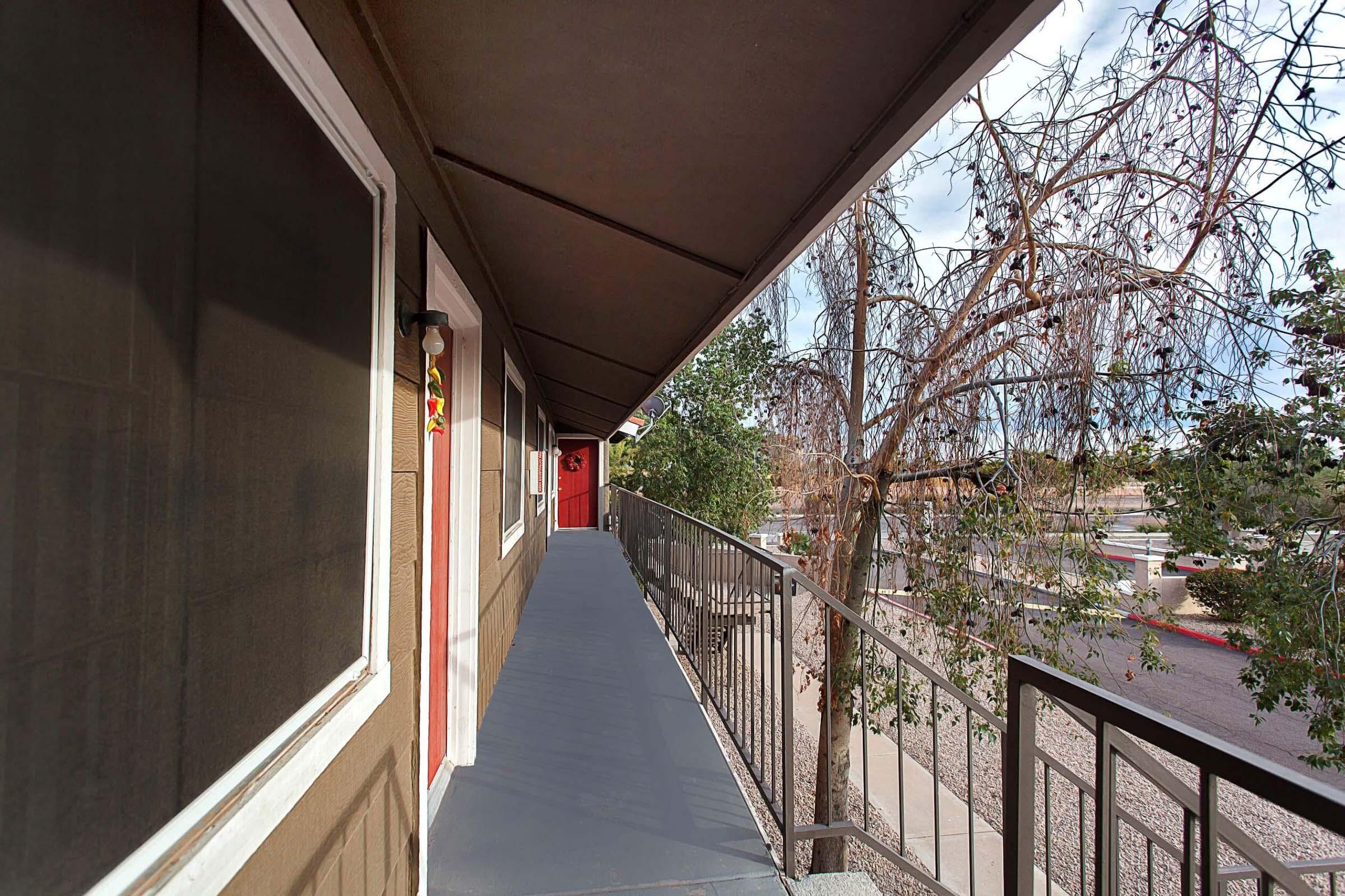 a building with a metal fence