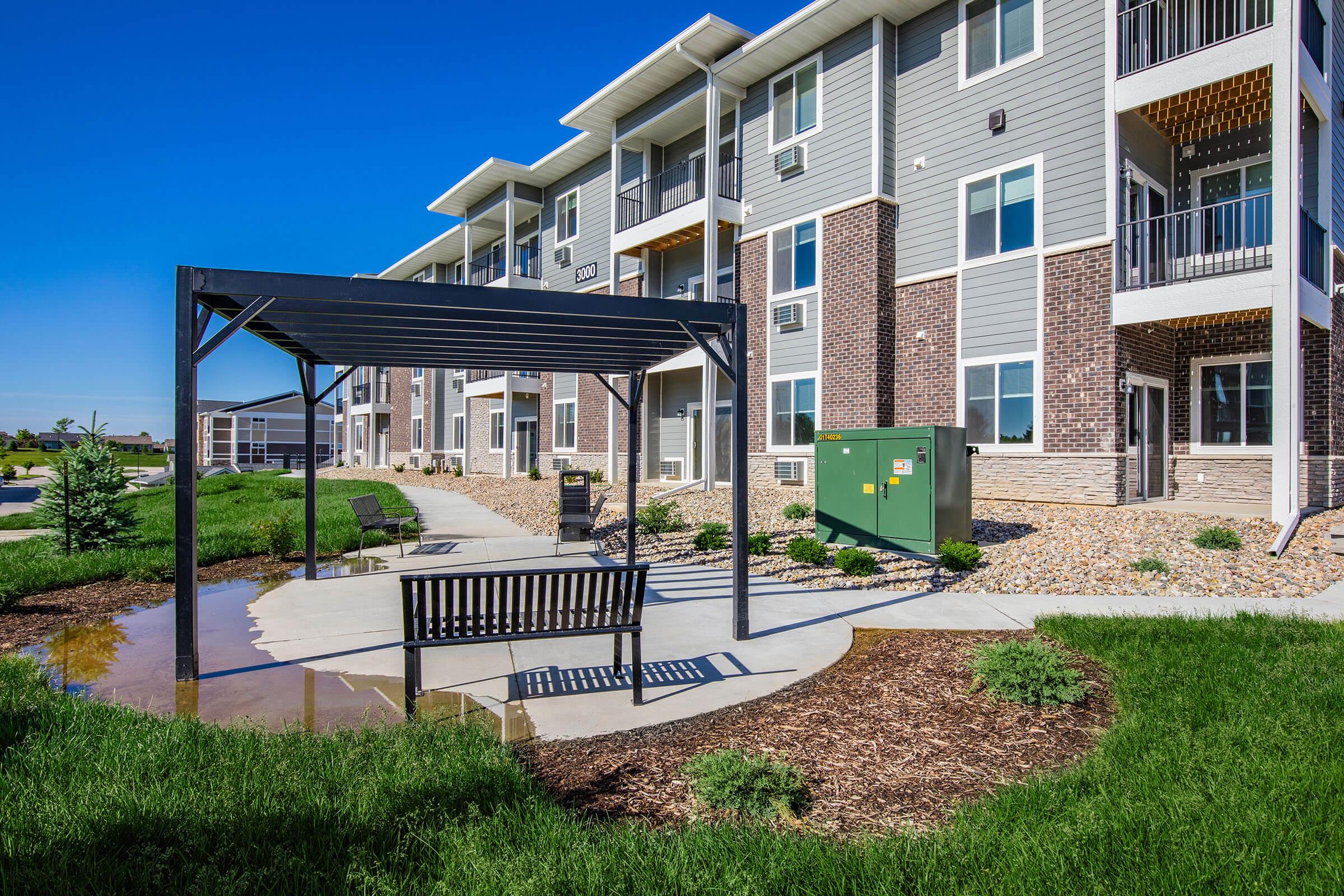 a large lawn in front of a building