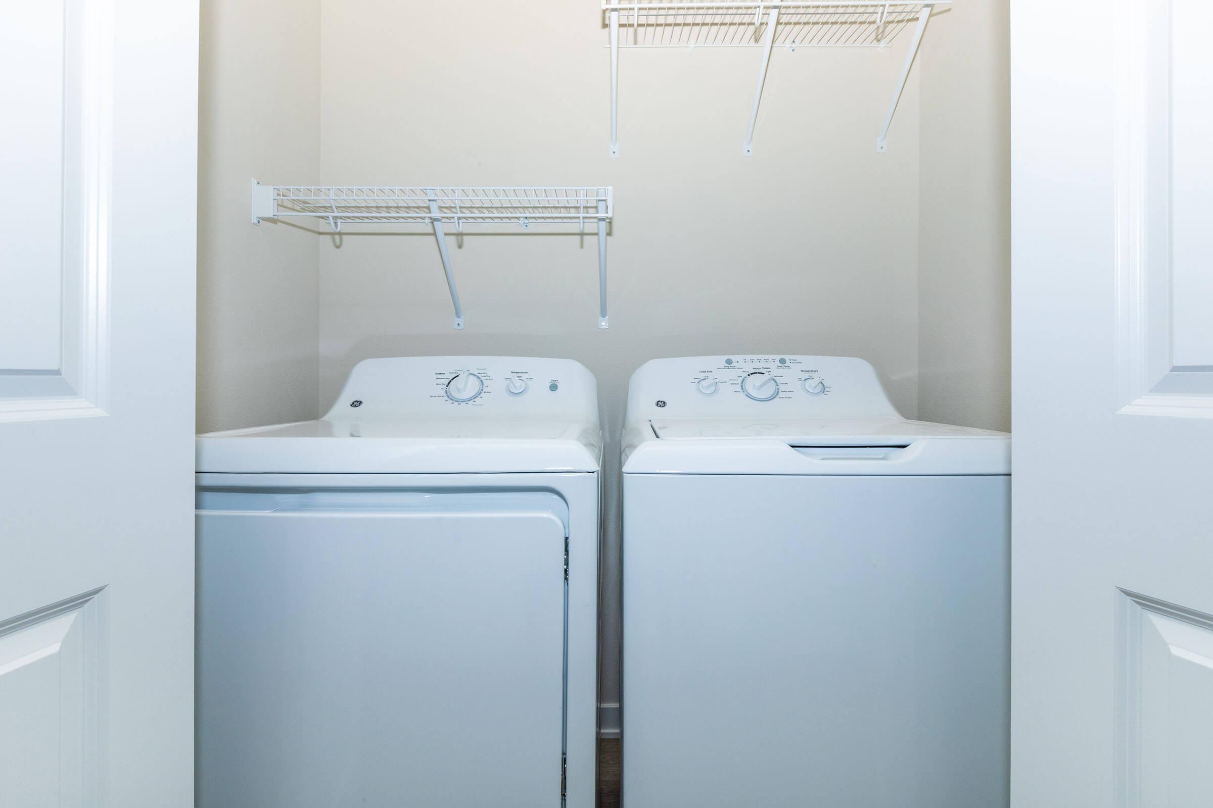 a kitchen with a sink and a refrigerator