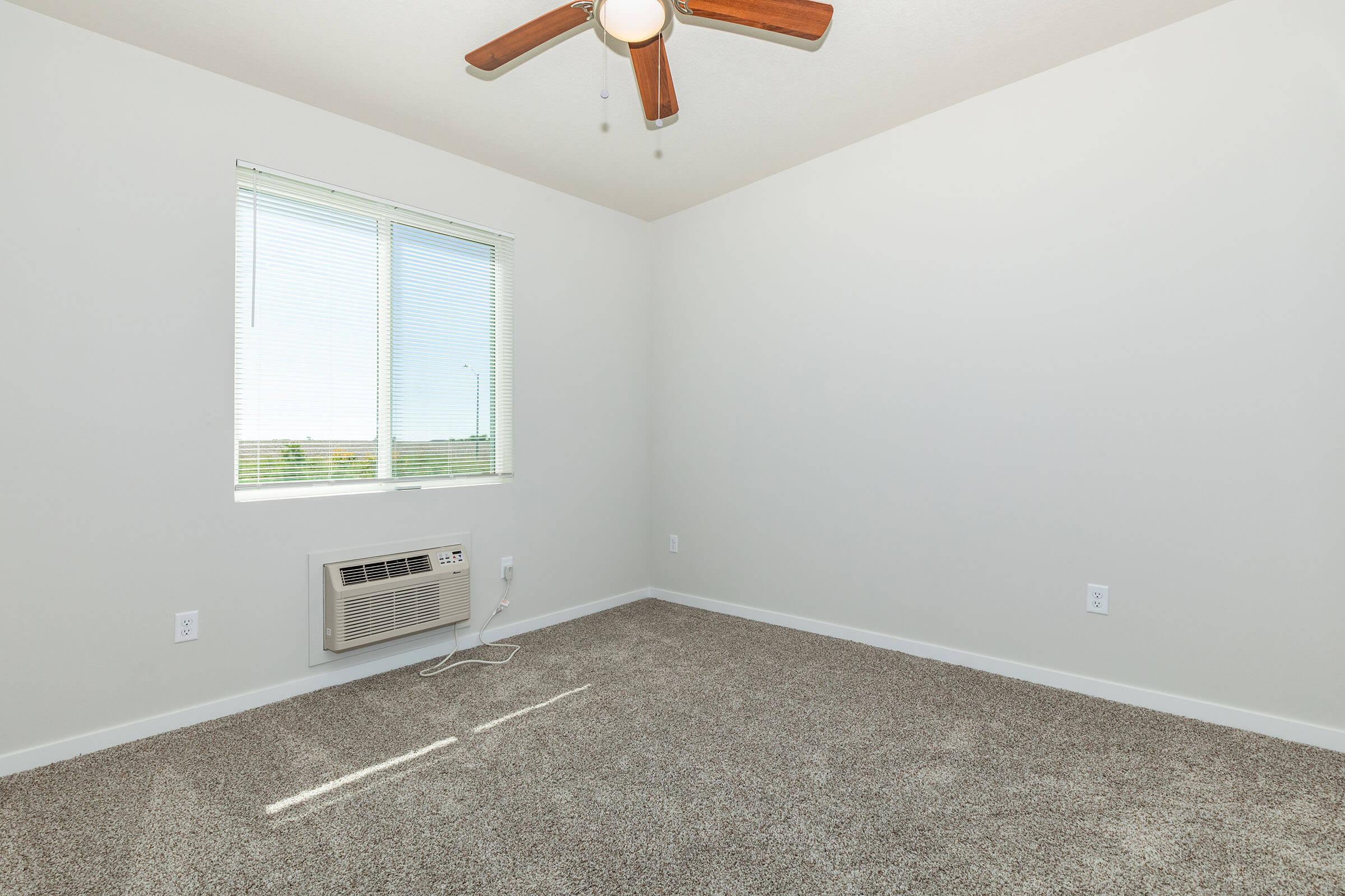 a room with a sink and a window