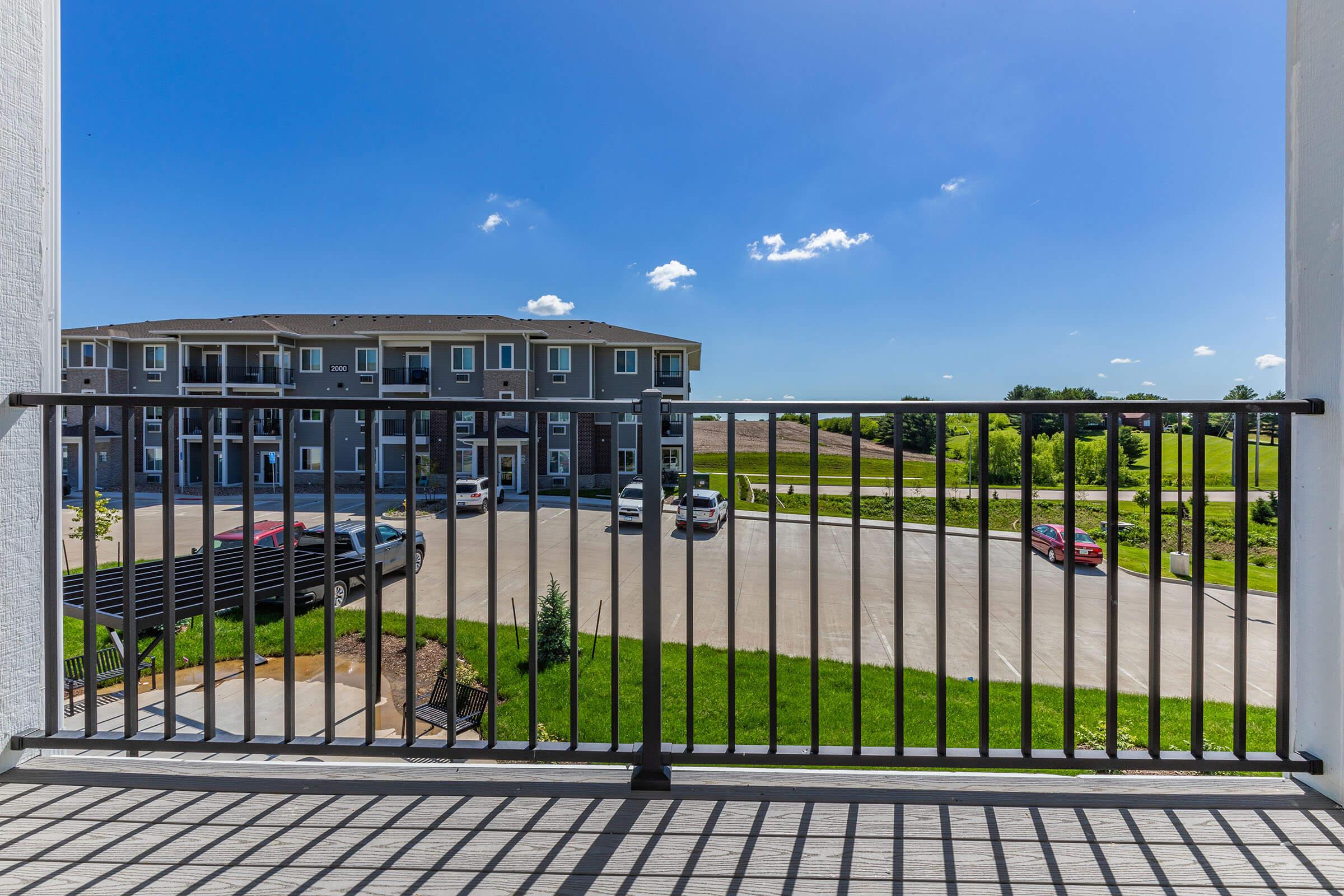 a building with a metal fence