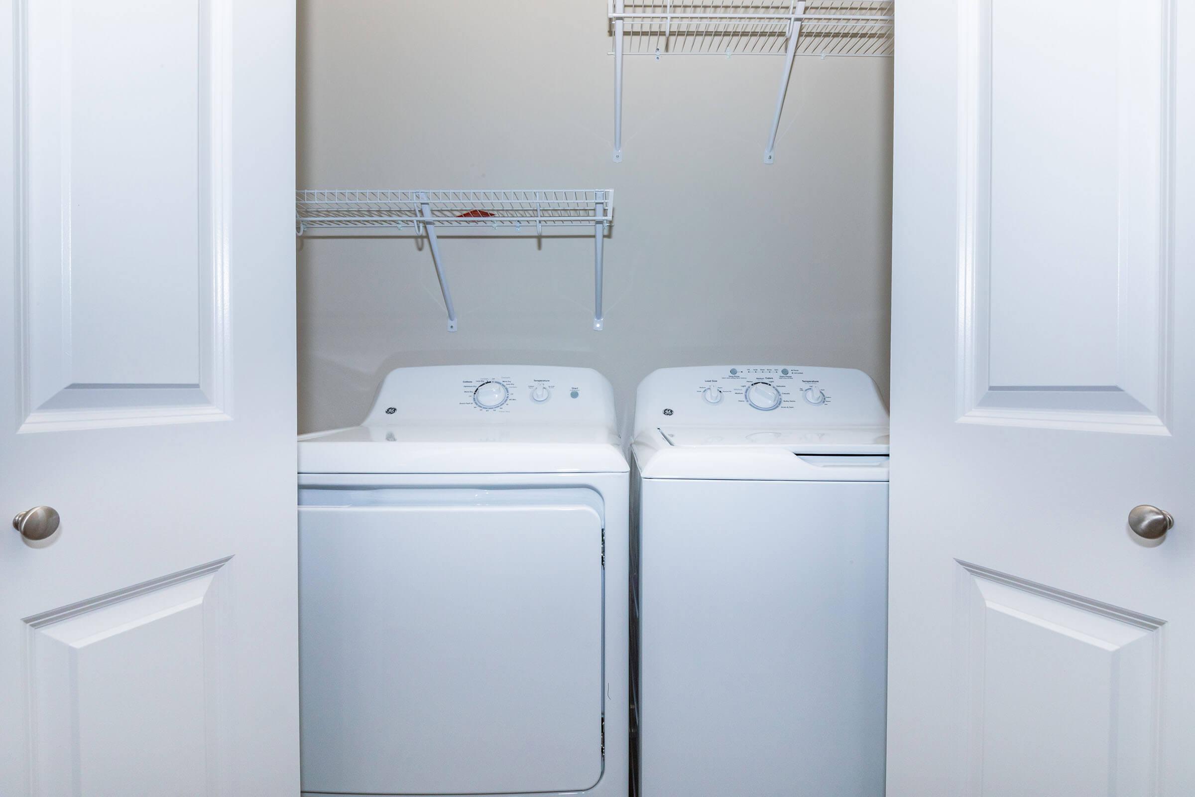 a kitchen with a sink and a refrigerator