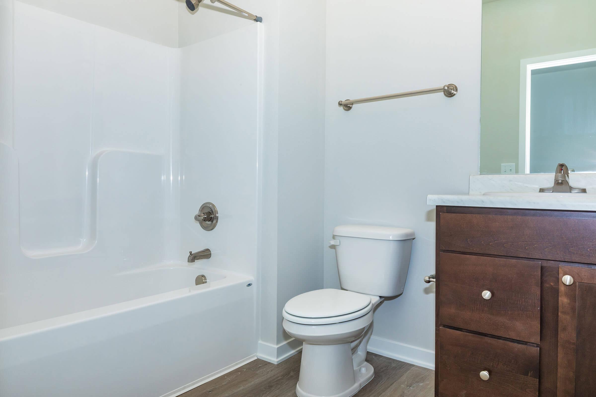 a room with a sink and a shower