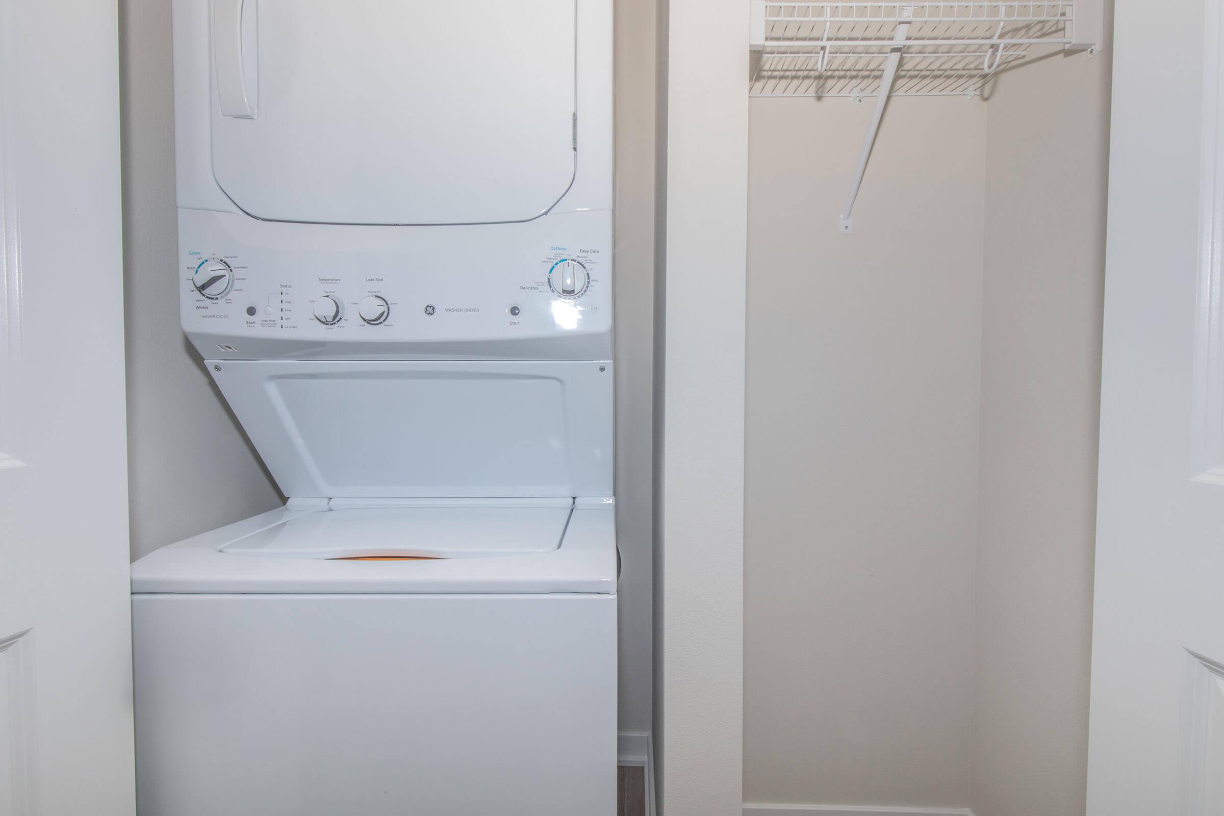 a stove top oven sitting inside of a refrigerator