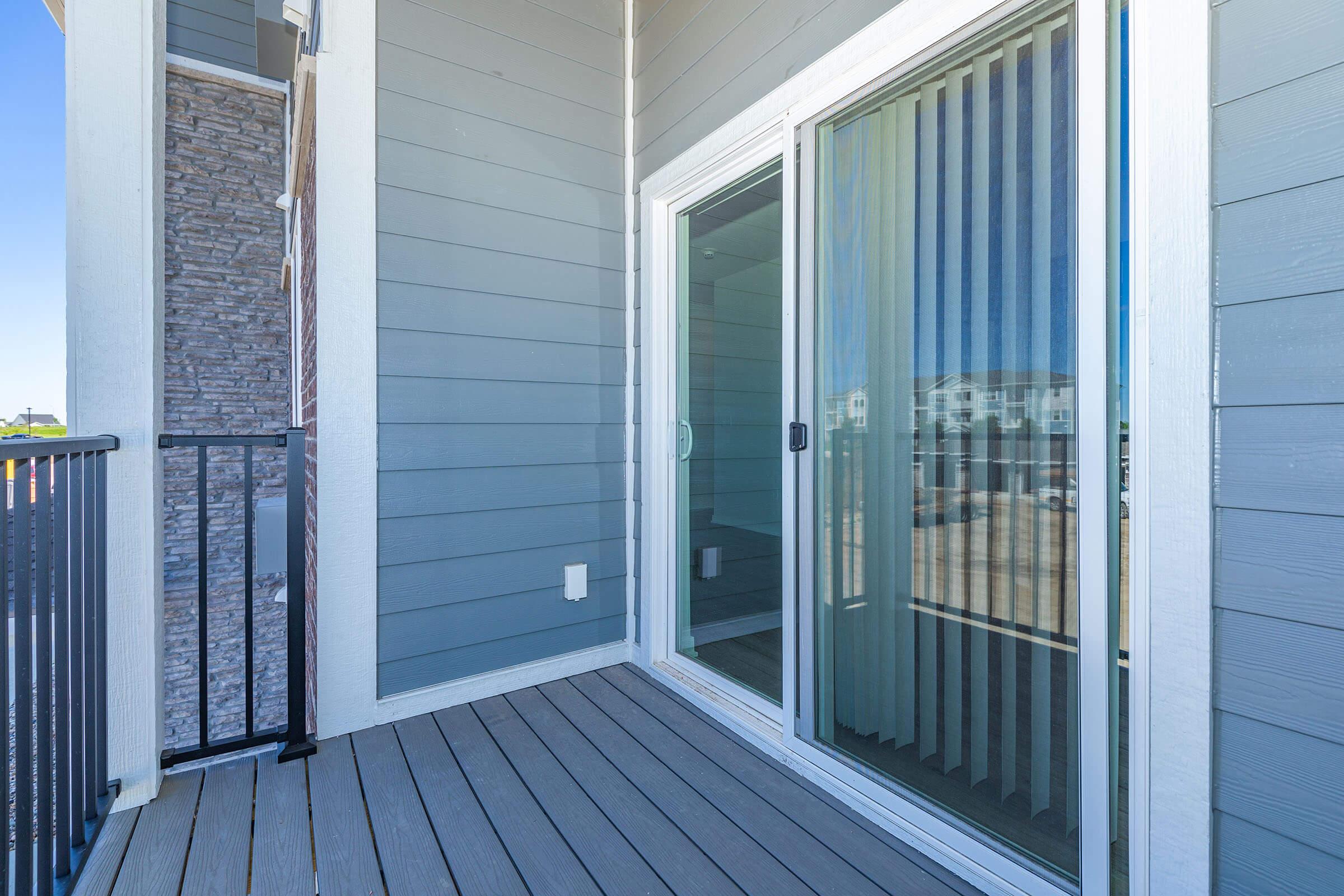 a glass door on the side of a building