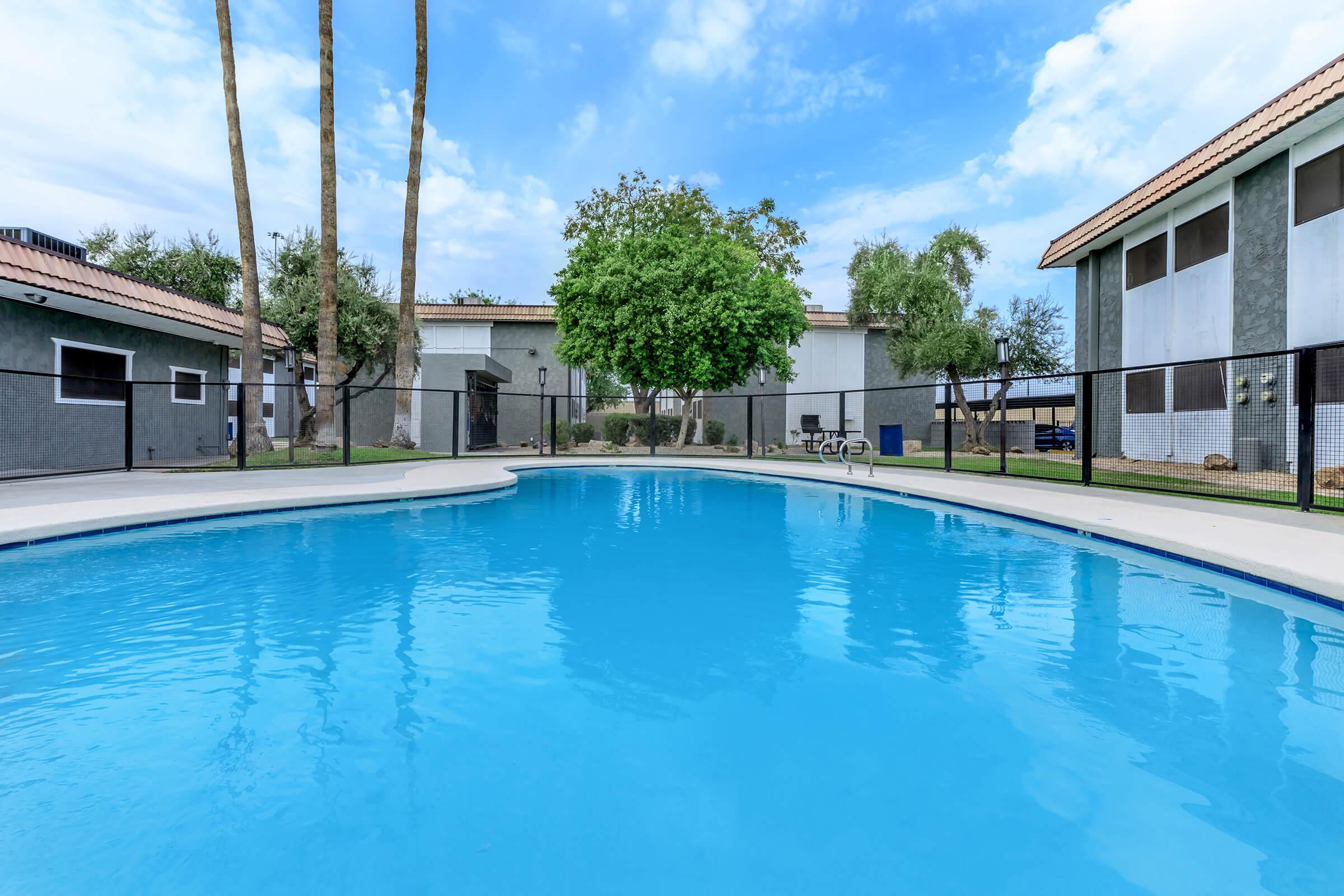 a house with a large pool of water