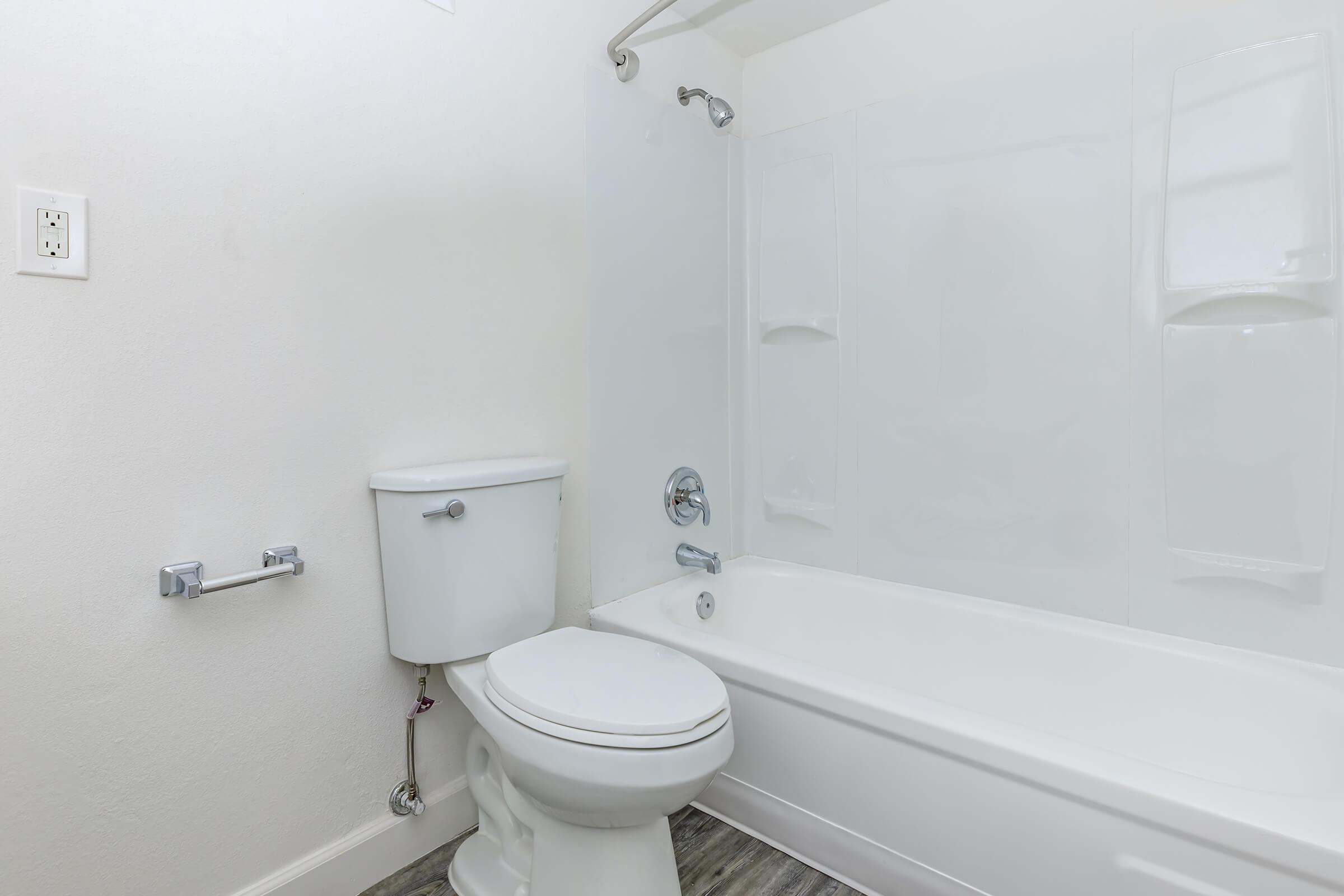 a close up of a shower in a small room