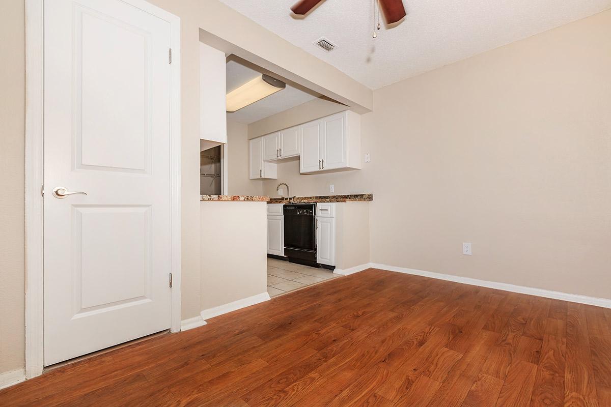 a kitchen with a wood floor