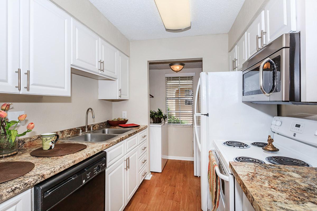 a modern kitchen with stainless steel appliances