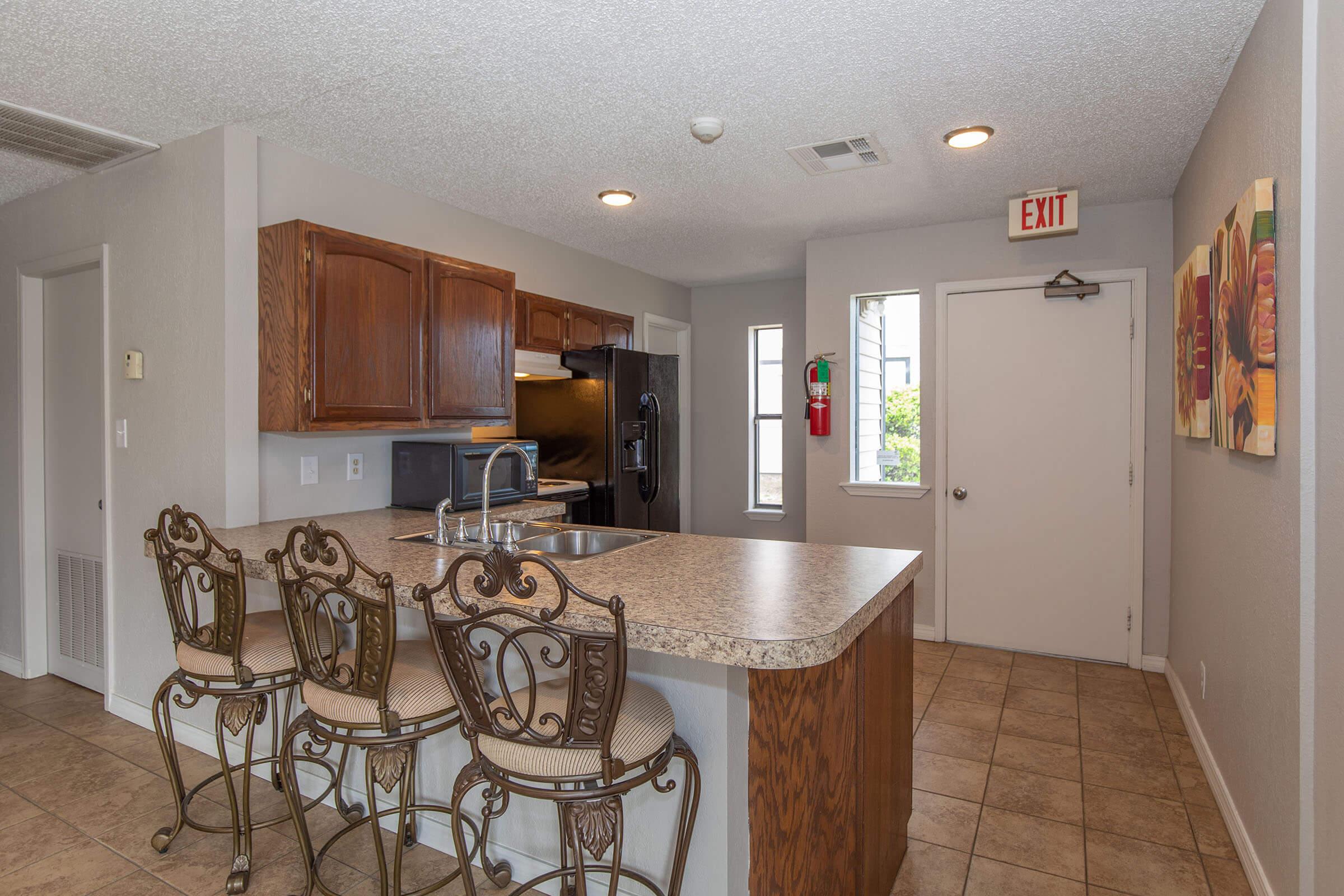 a kitchen with a dining room table