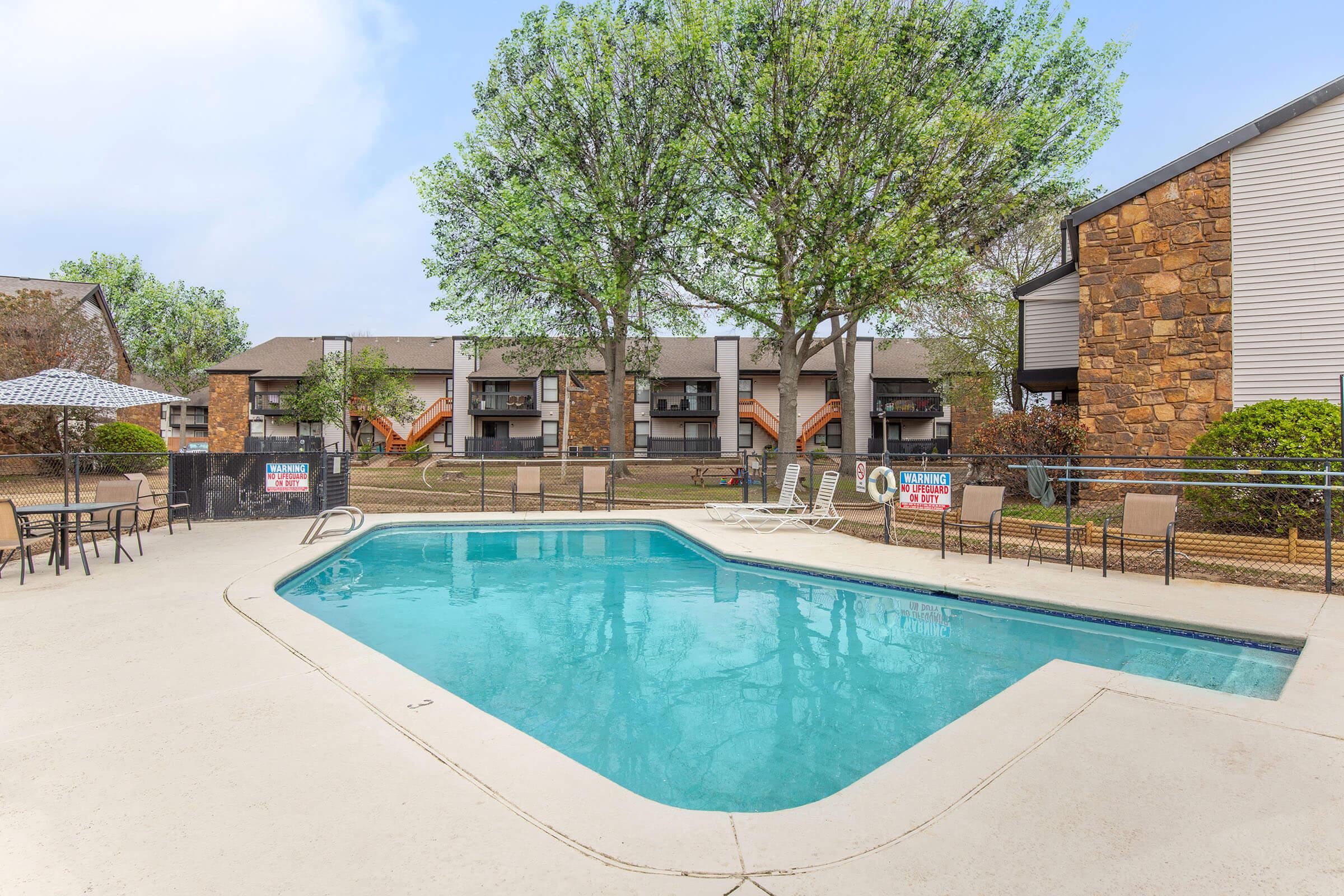 a pool next to a building