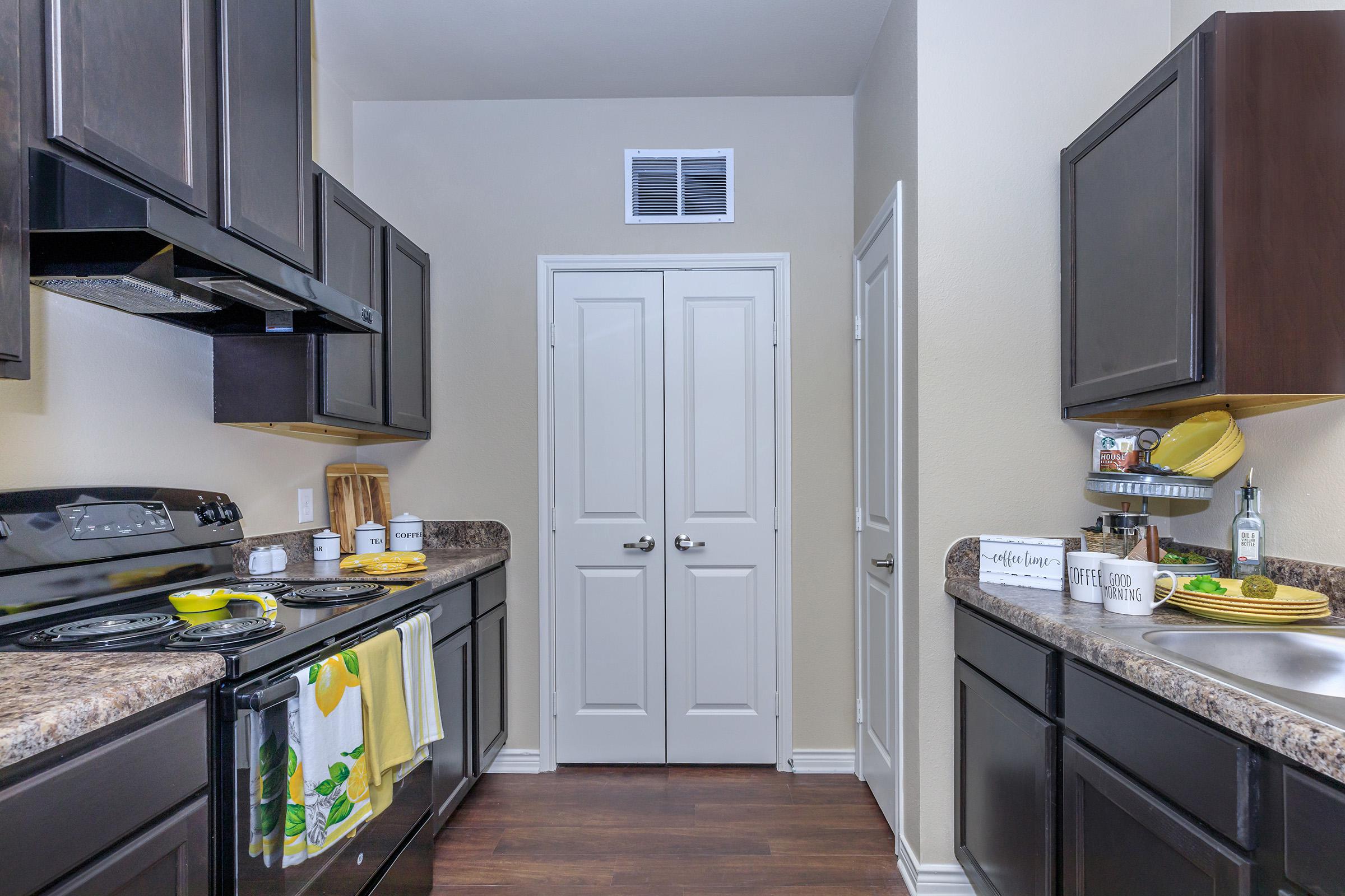 a modern kitchen with stainless steel appliances