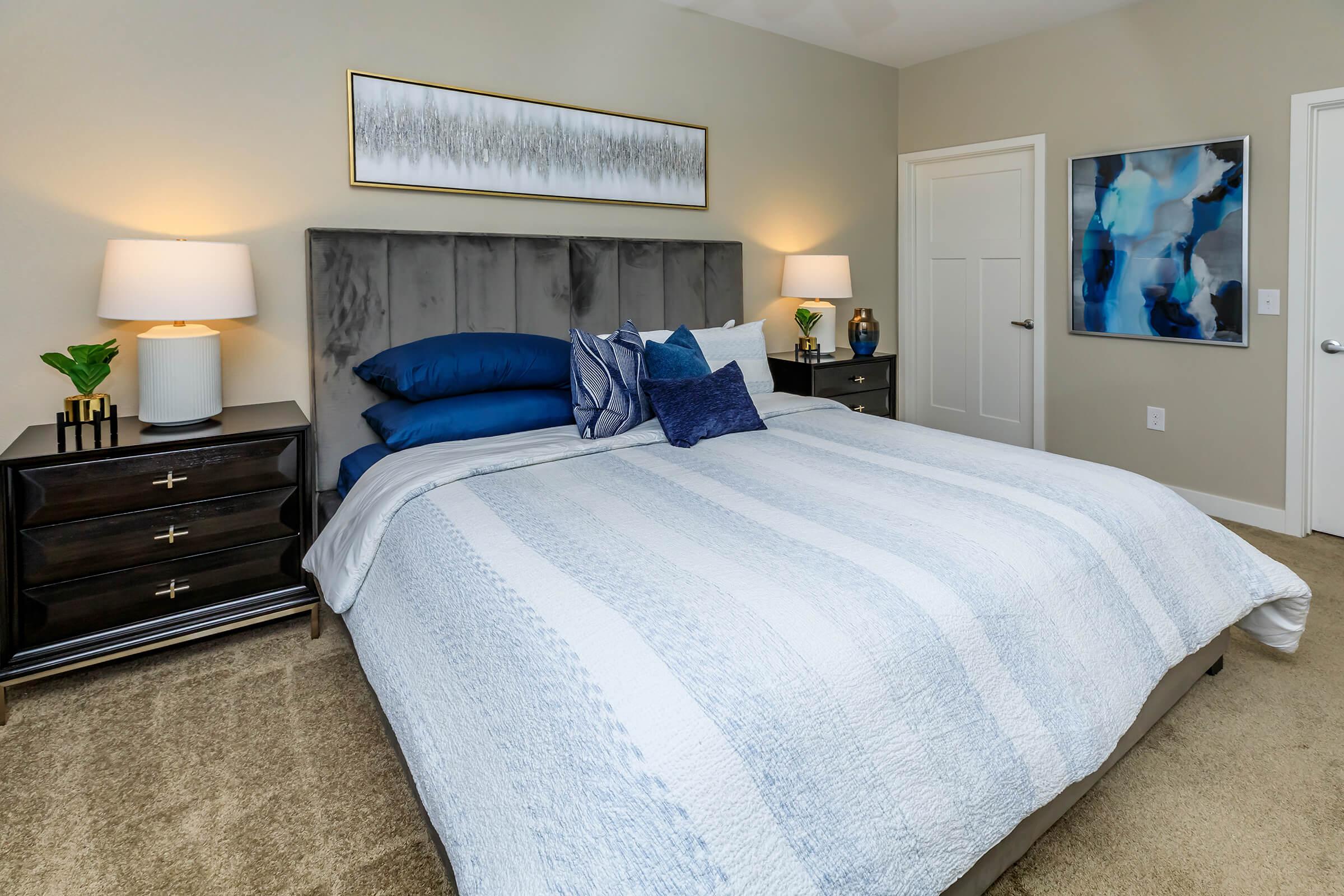 Bedroom with blue pillows
