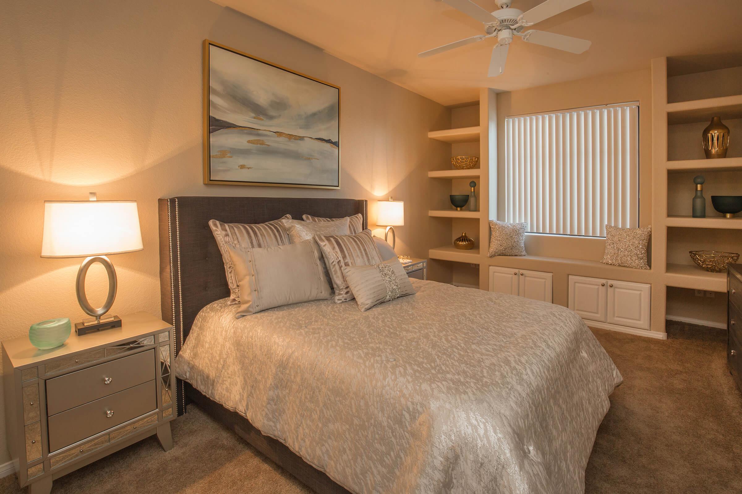 a bedroom with a large bed in a room