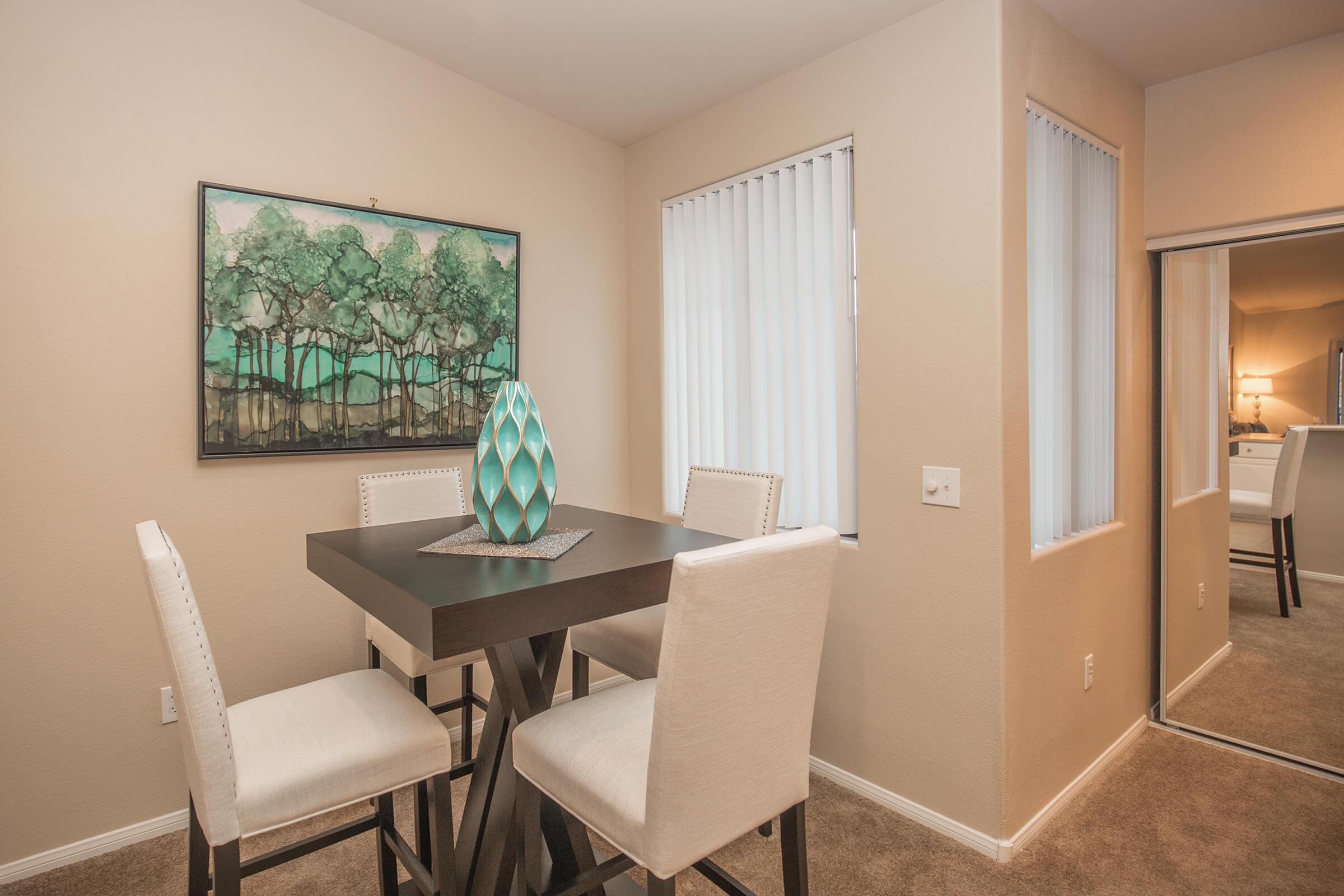a room filled with furniture and a large window