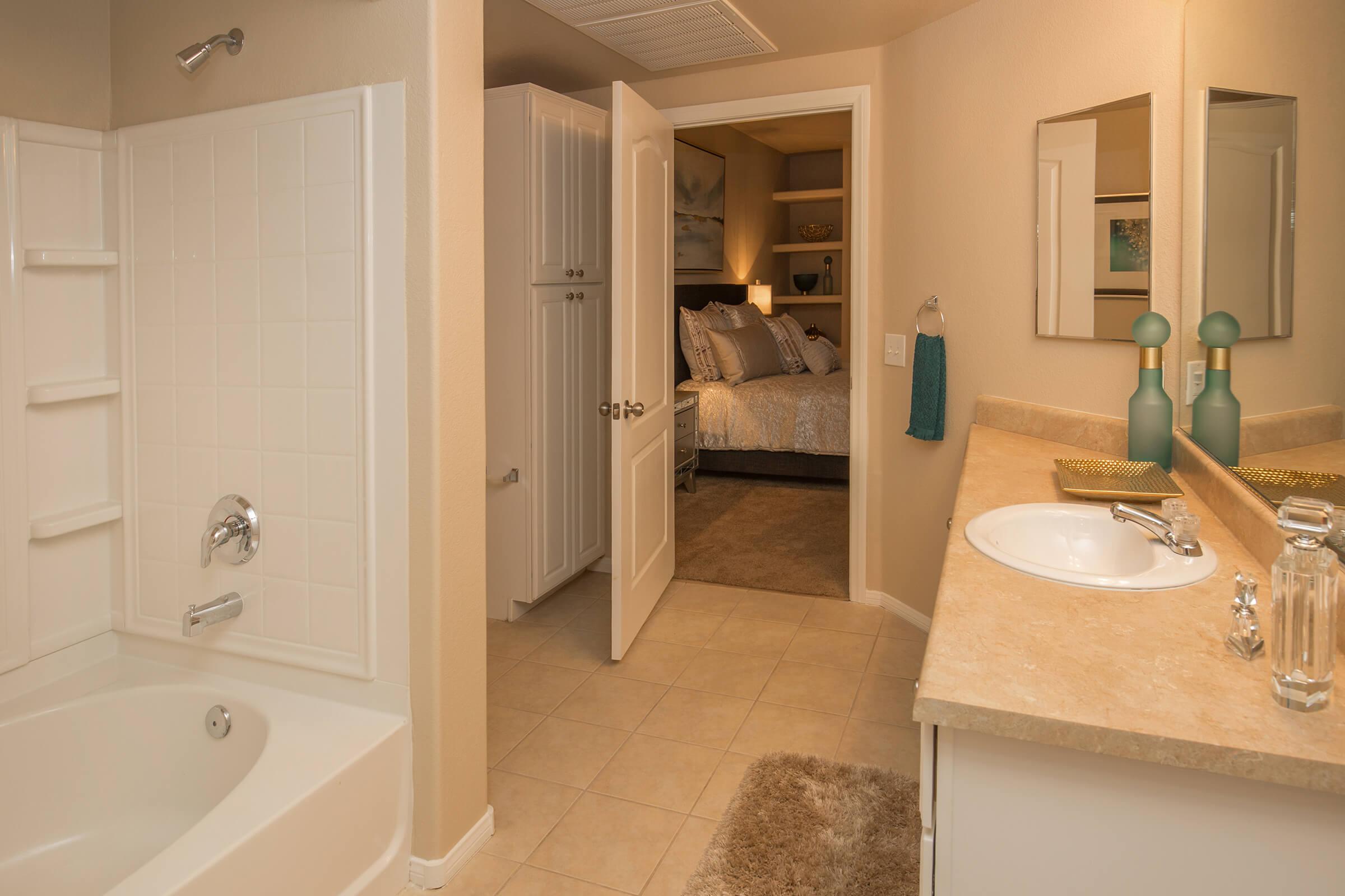 a double sink and large mirror