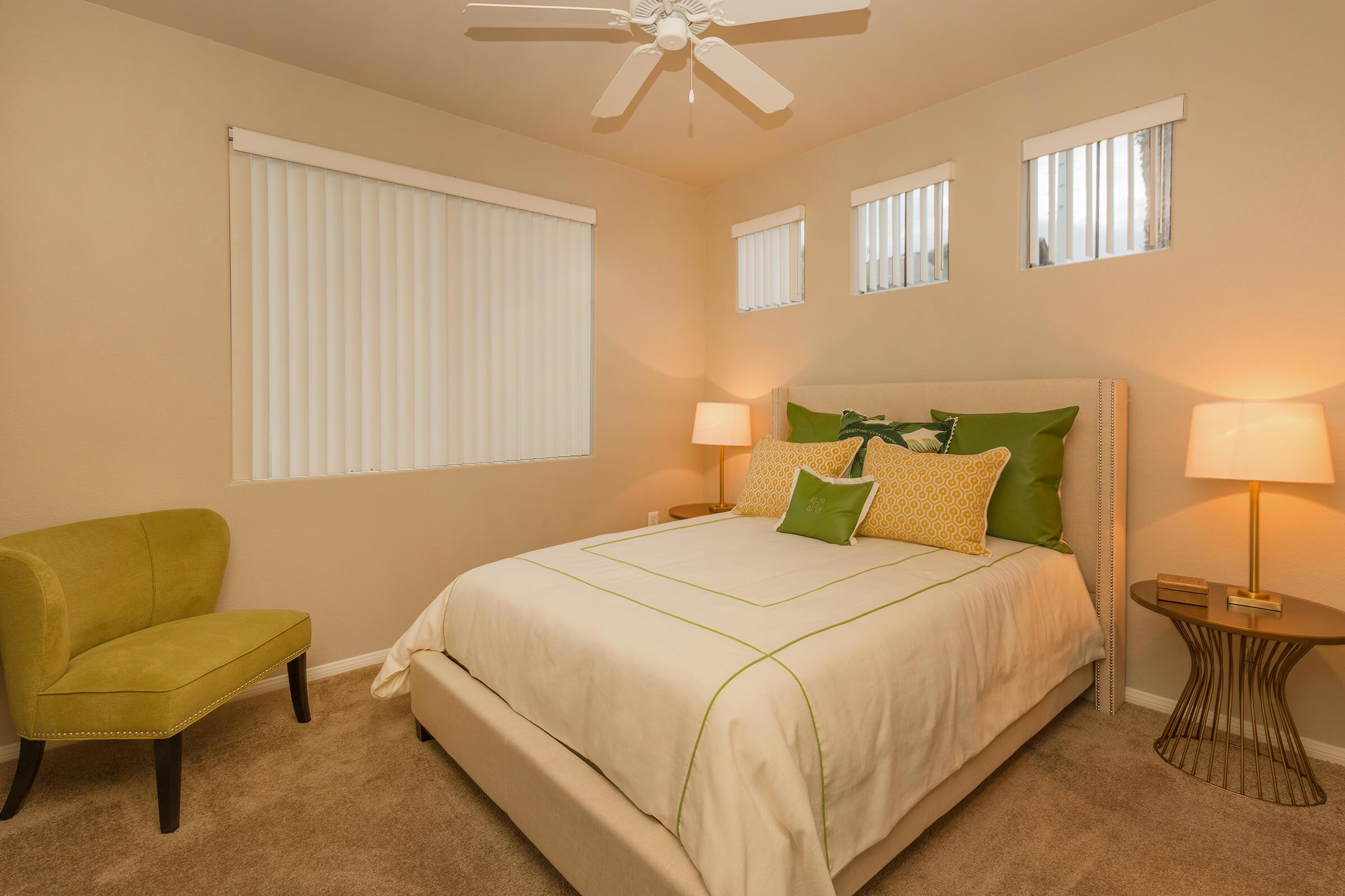 a bedroom with a bed in a hotel room
