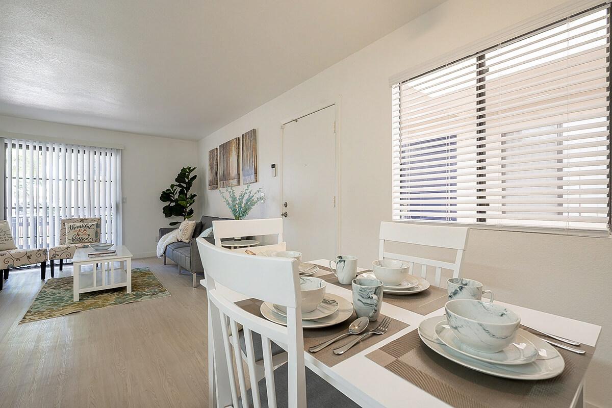 a kitchen with a table in a room