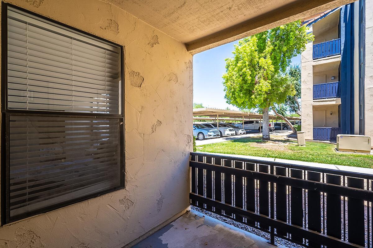 a bench in front of a window