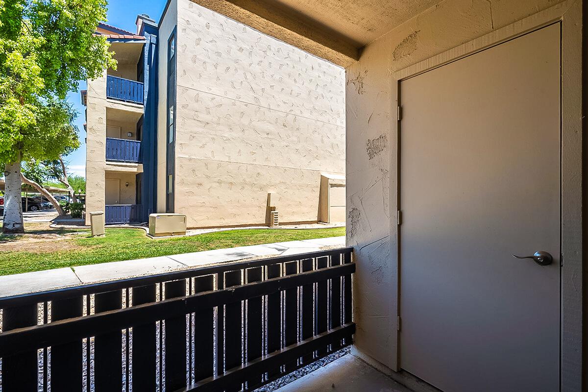a building on the side of a fence