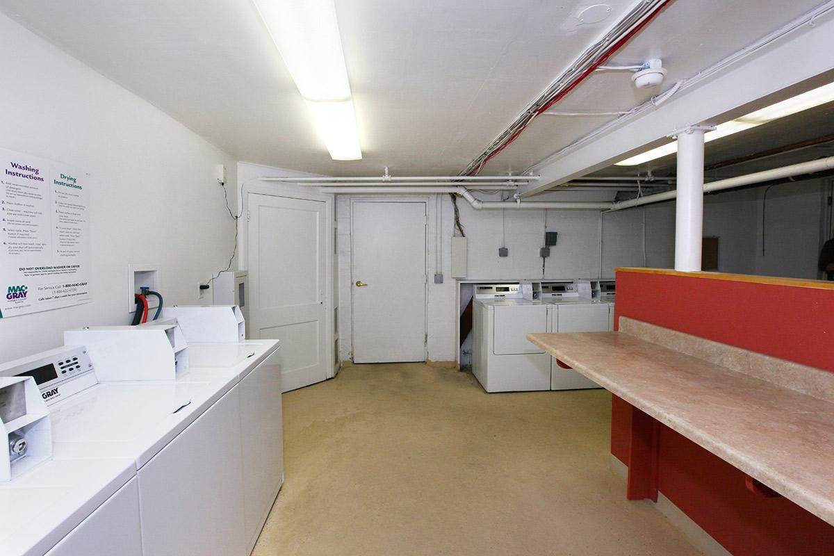 a large white refrigerator in a kitchen