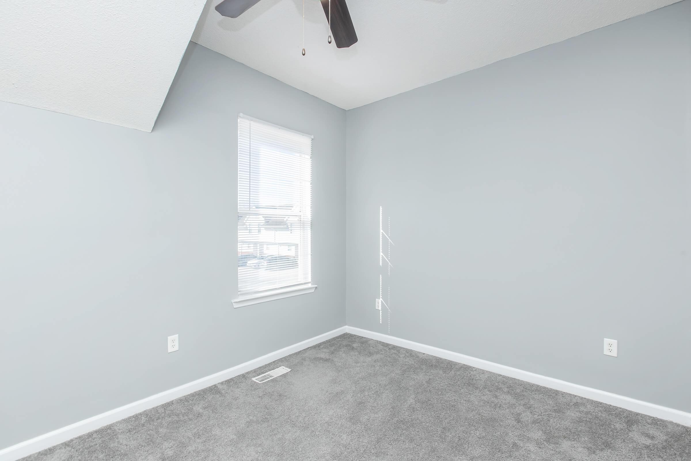 a room with a sink and a window