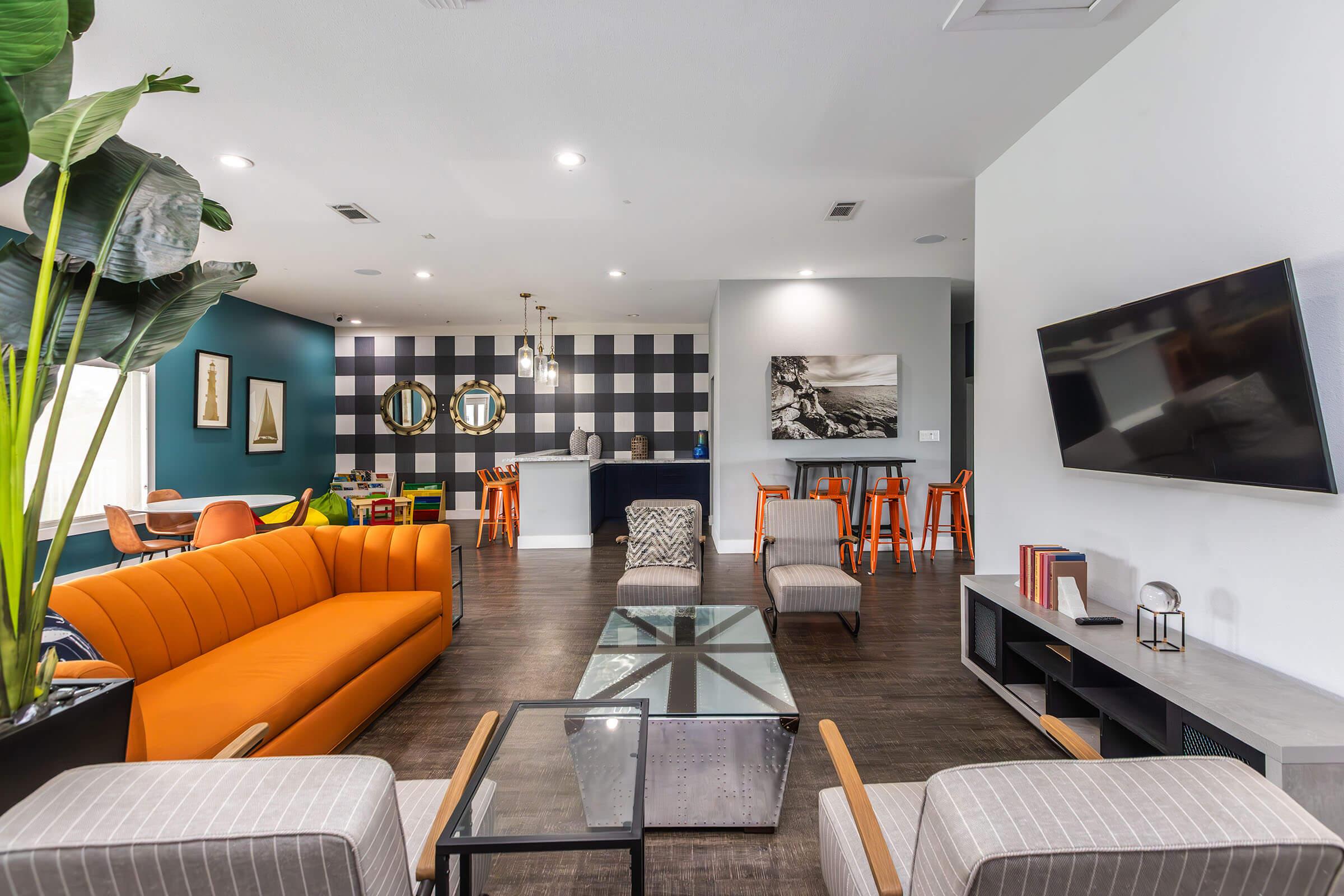 a living room filled with furniture and a table