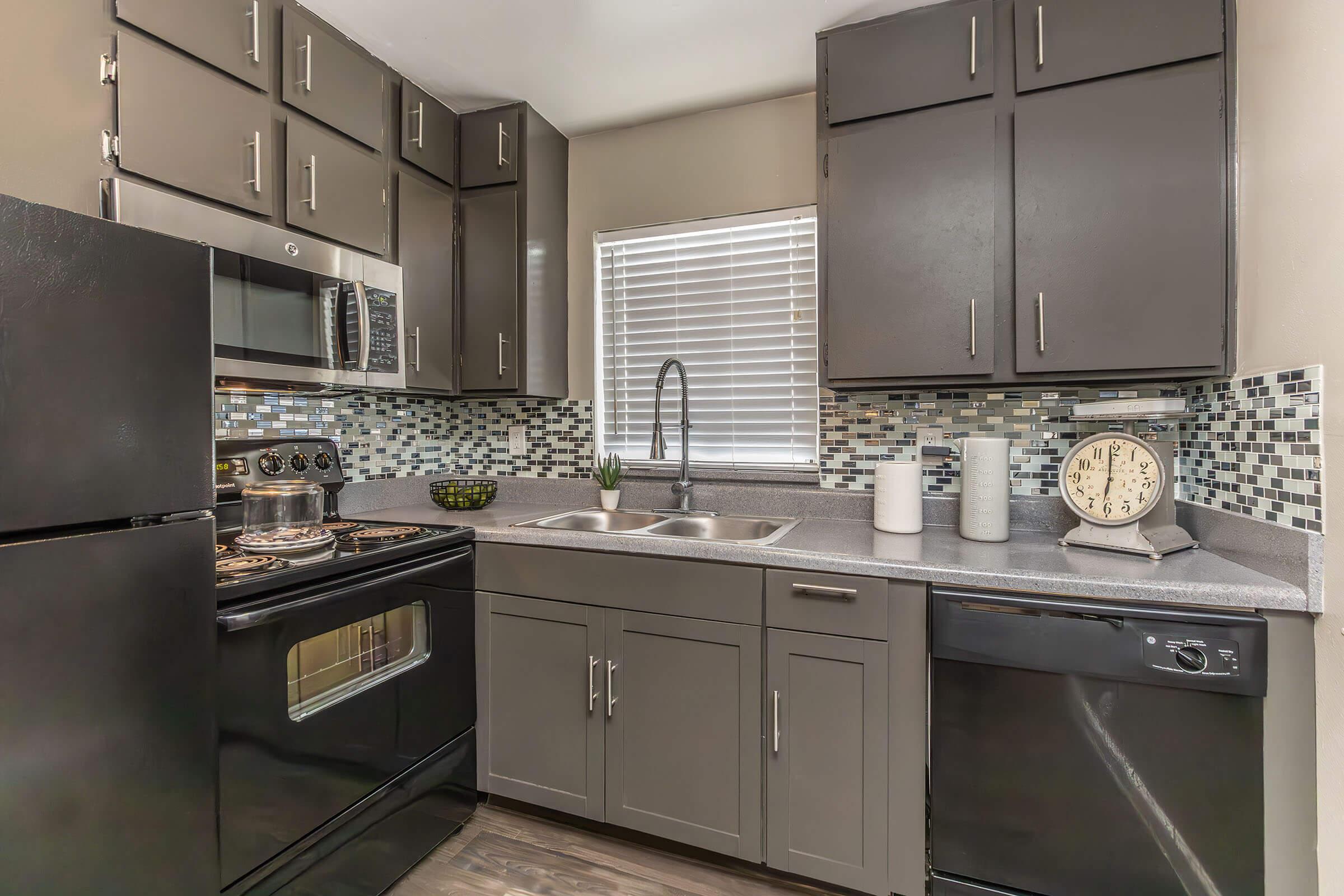 a kitchen with stainless steel appliances