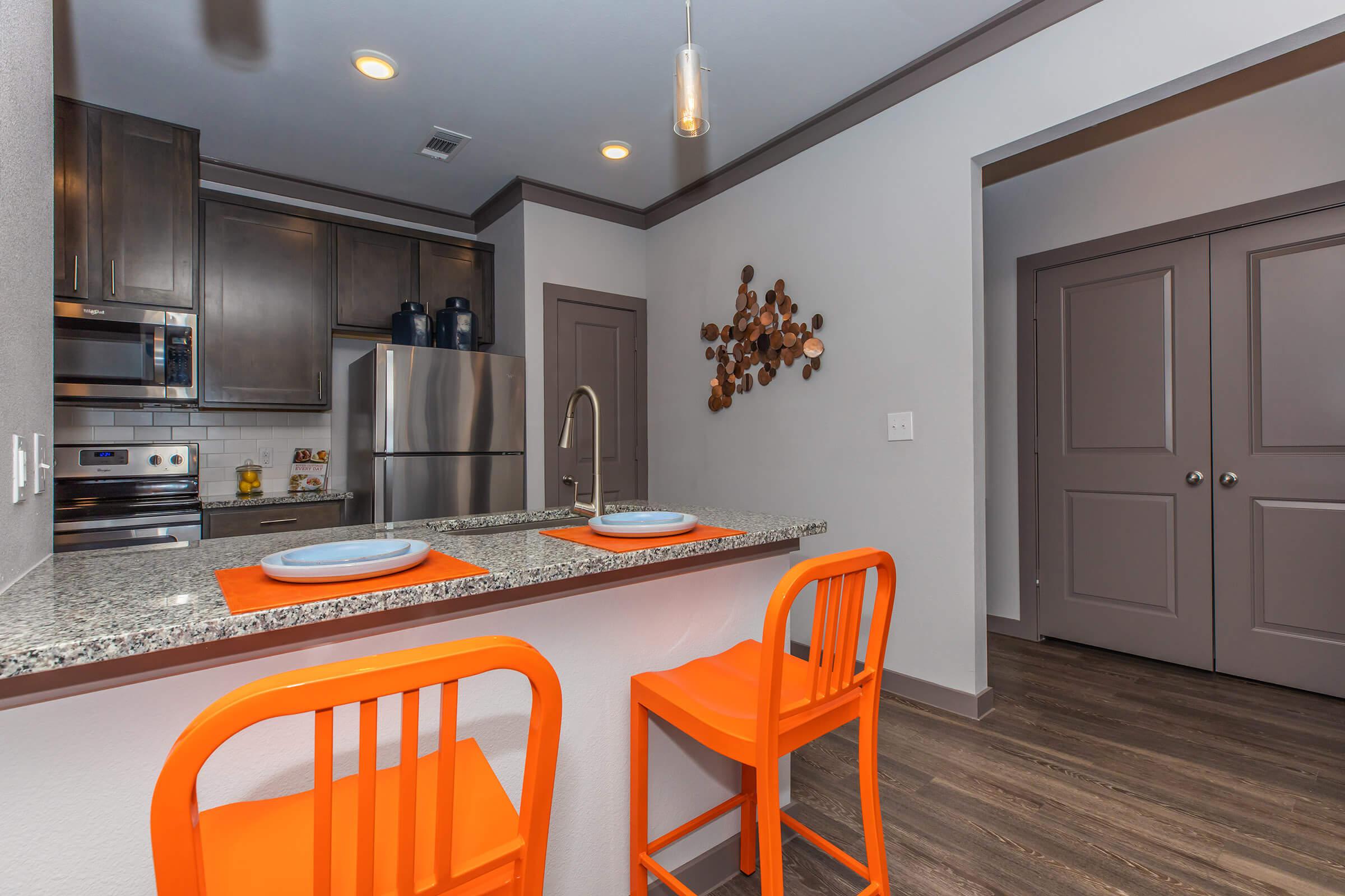 a kitchen with a dining table