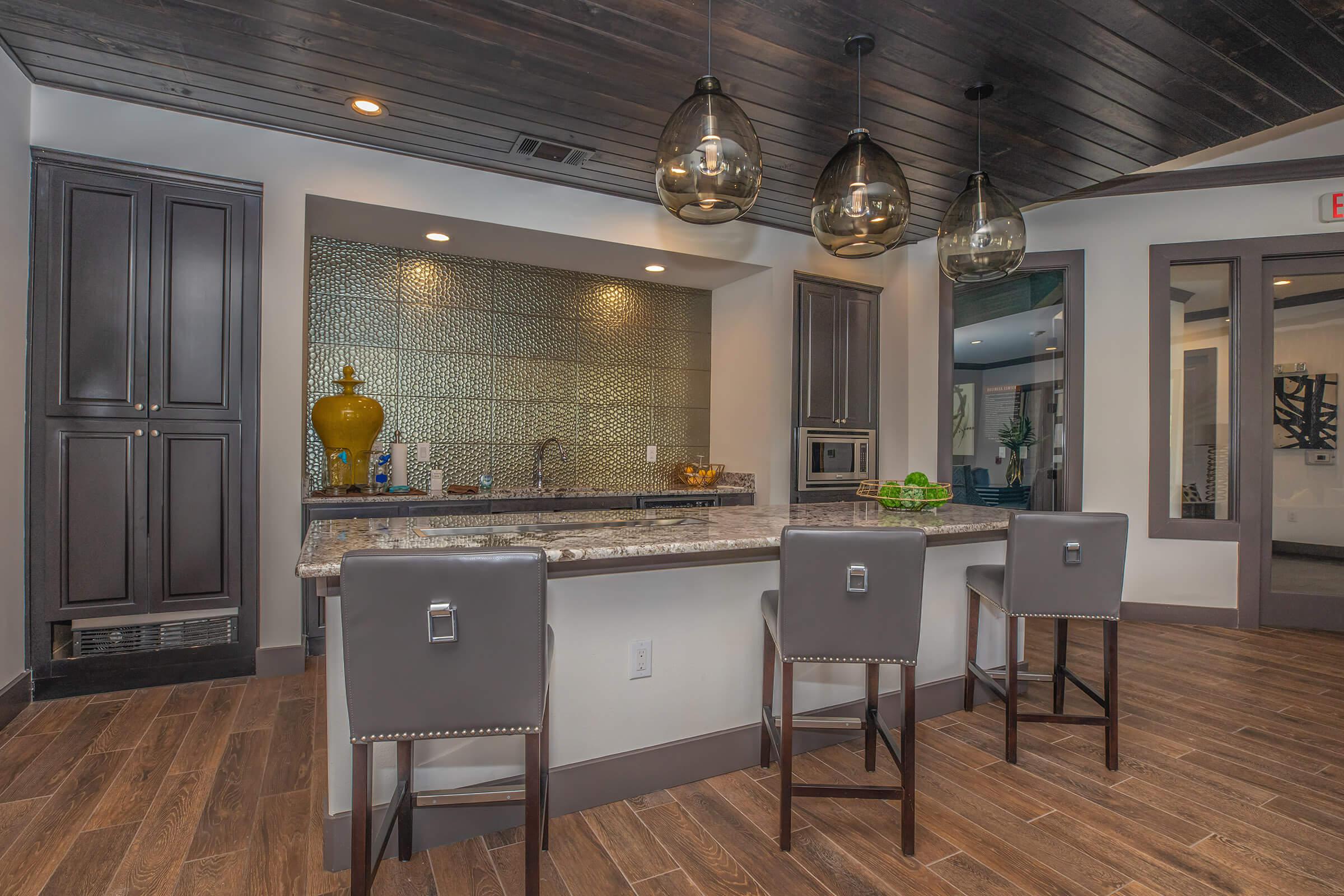 a kitchen with a dining room table