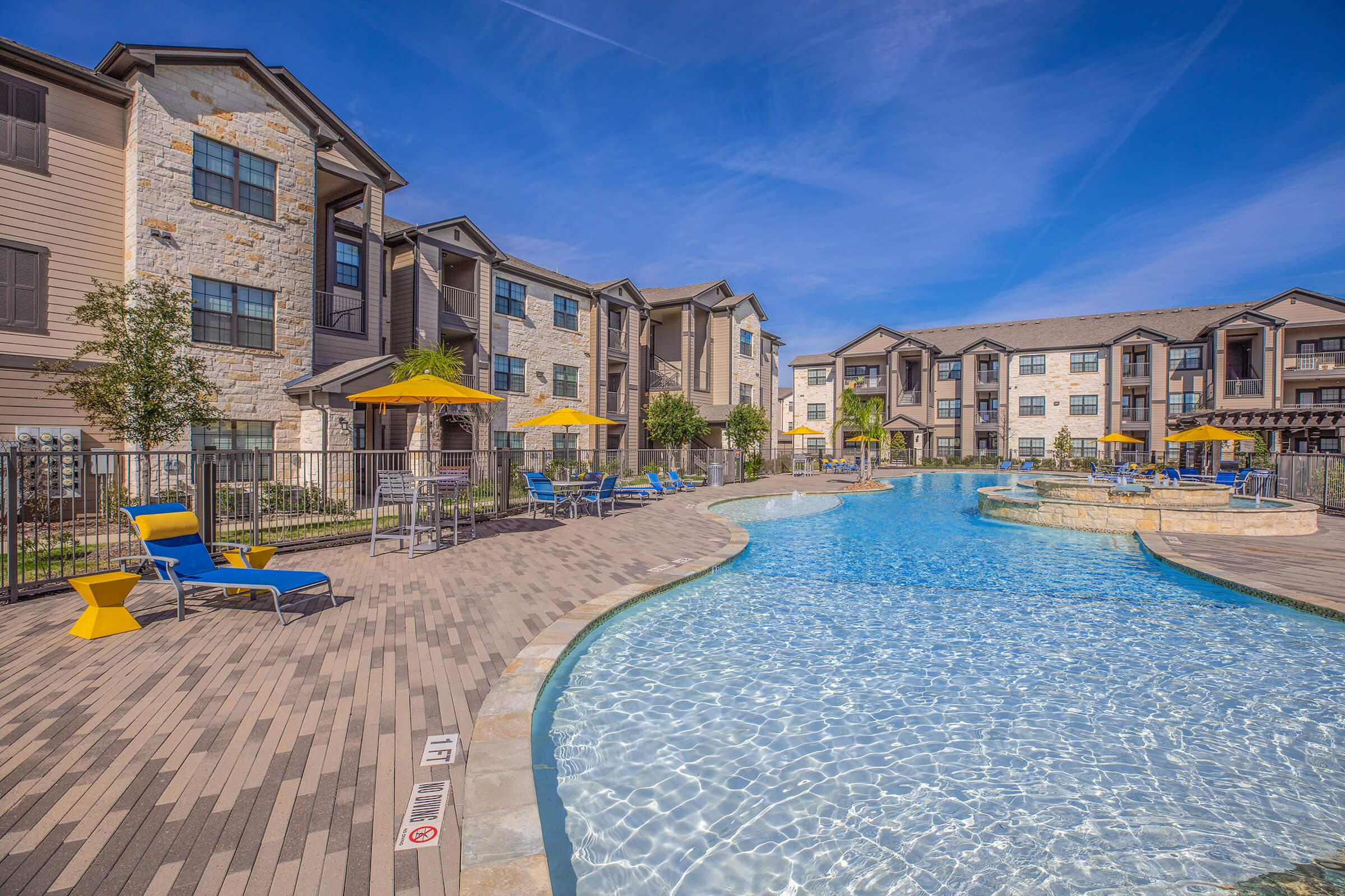 a pool next to a building