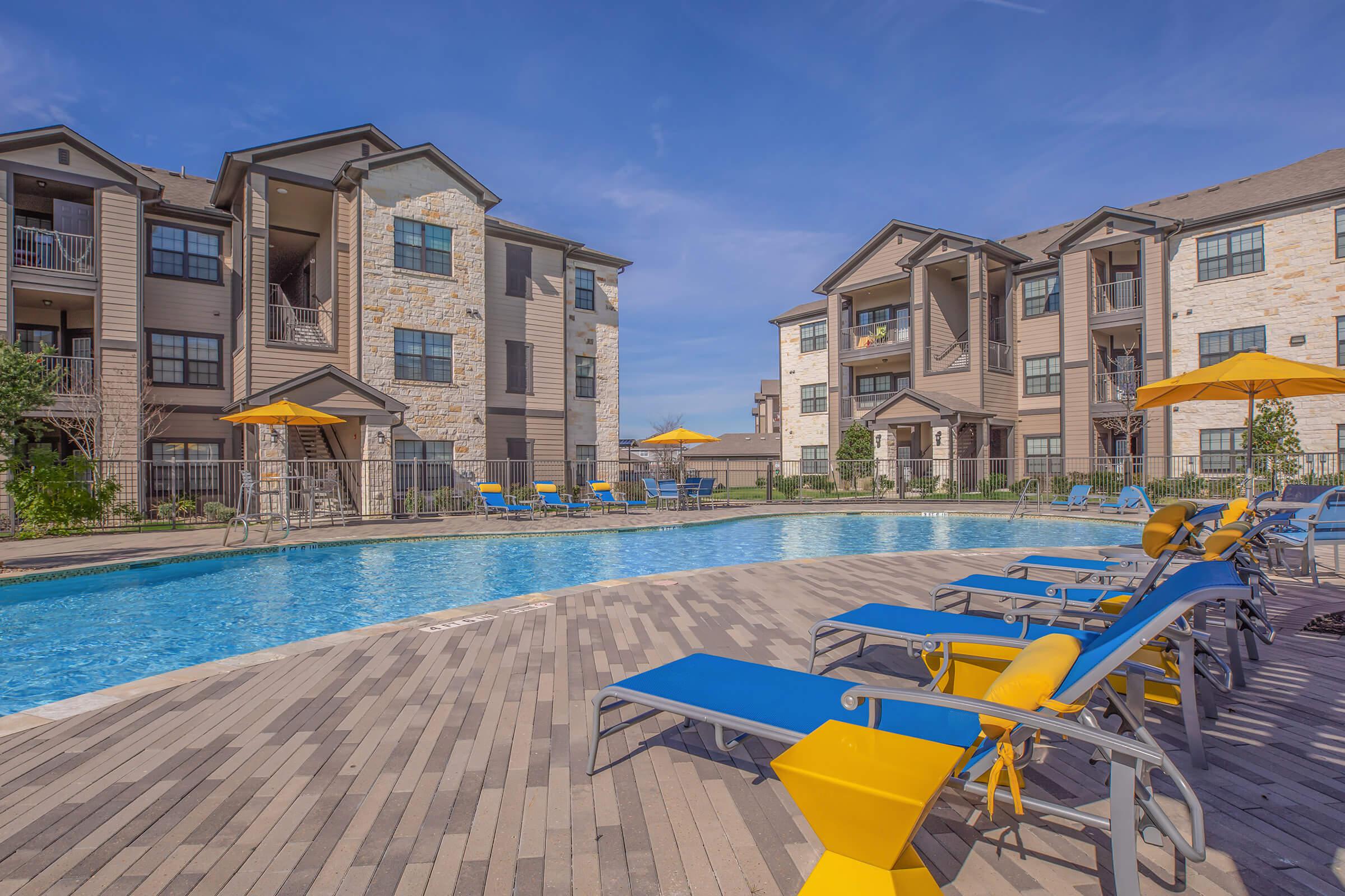 a pool next to a building